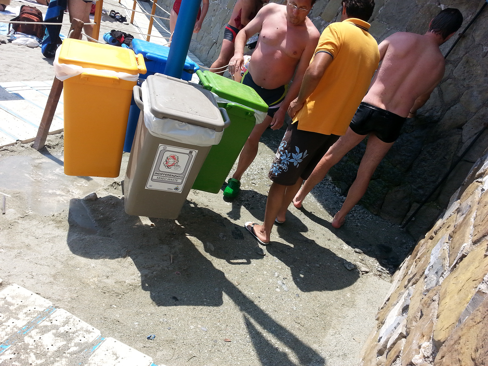 Beach goers rinse off after a pleasant Monterosso afternoon.