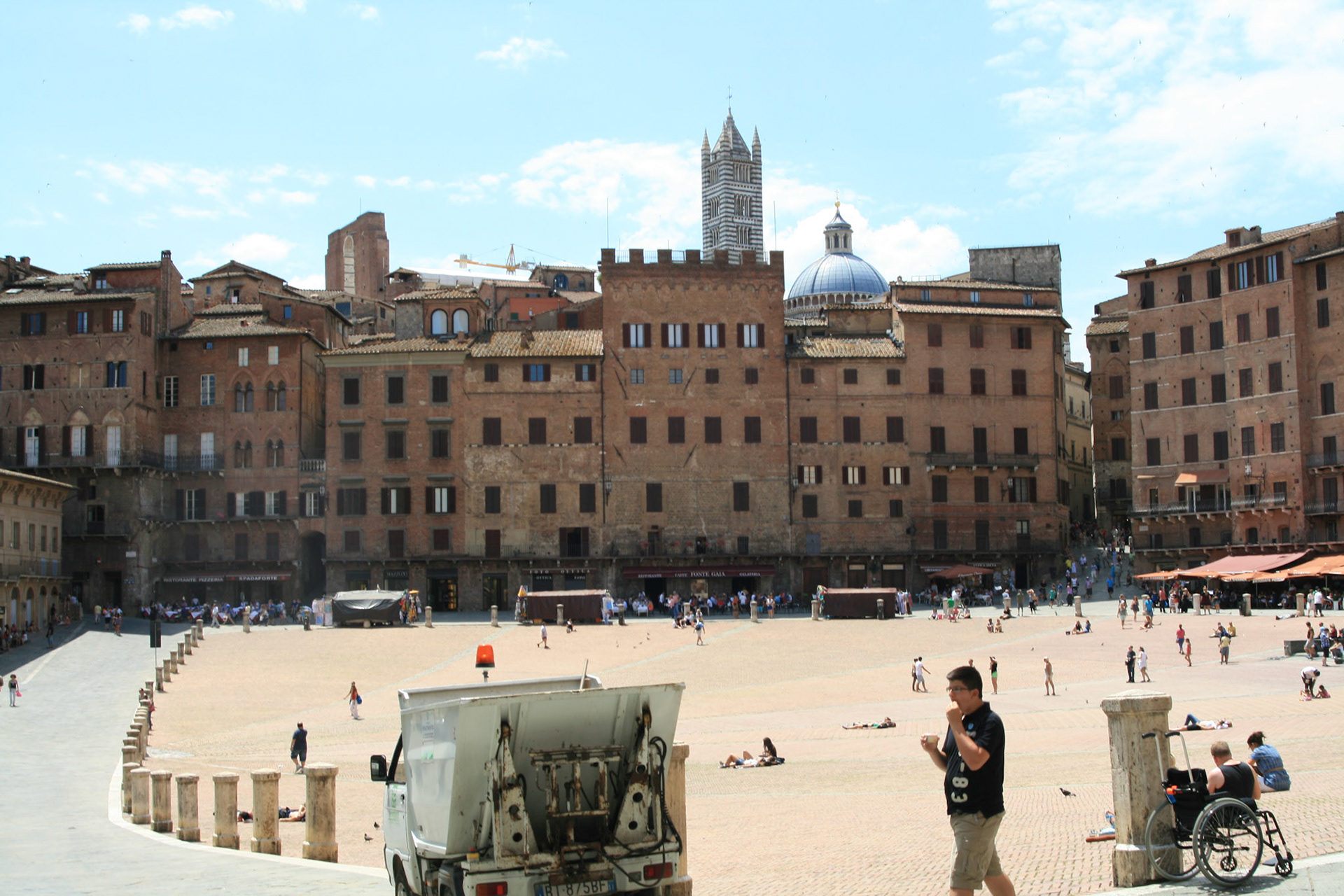 The open site was a marketplace established before the thirteenth century on a sloping site near the meeting point of the three hillside communities that coalesced to form Siena: the Castellare, the San Martino and the Camollia. 