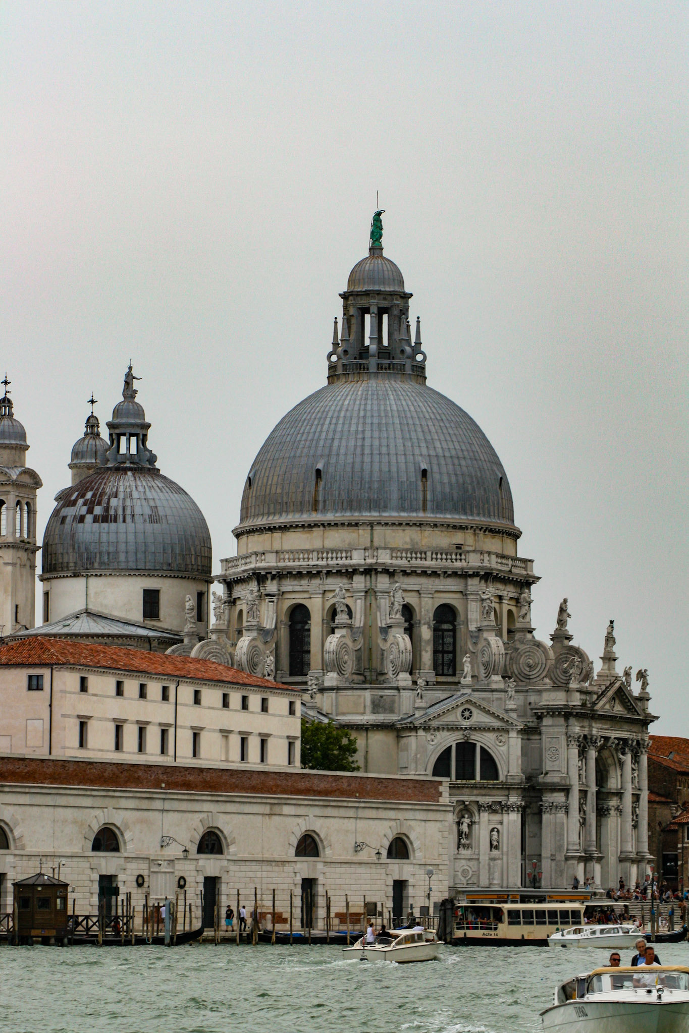 Basilica of Saint Mary of Health (1631-1687) on the Grand Canal and Customs Point. With its triangular shape, Punta della Dogana