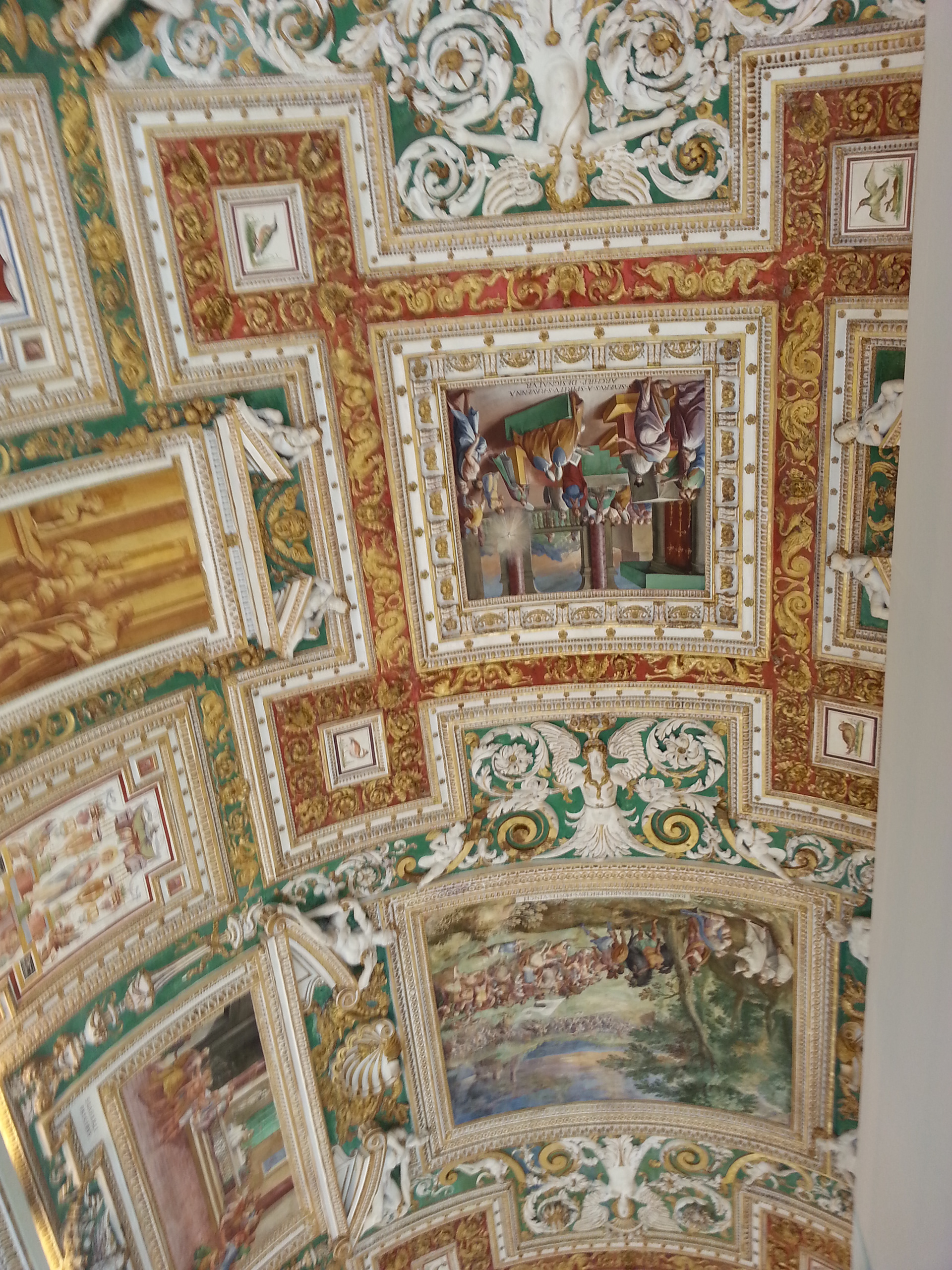  Even more than the ceiling's beautiful grandeur, the frescoes' symbolism and geographic placement within the great hall are astonishing. The fresco scenes that line the barrel-vaulted ceiling depict a variety of saints, apostles, martyrs, and other figures of Christianity. The figures within these frescoes can be linked to their location on the map, which is found on the wall just below the painting.