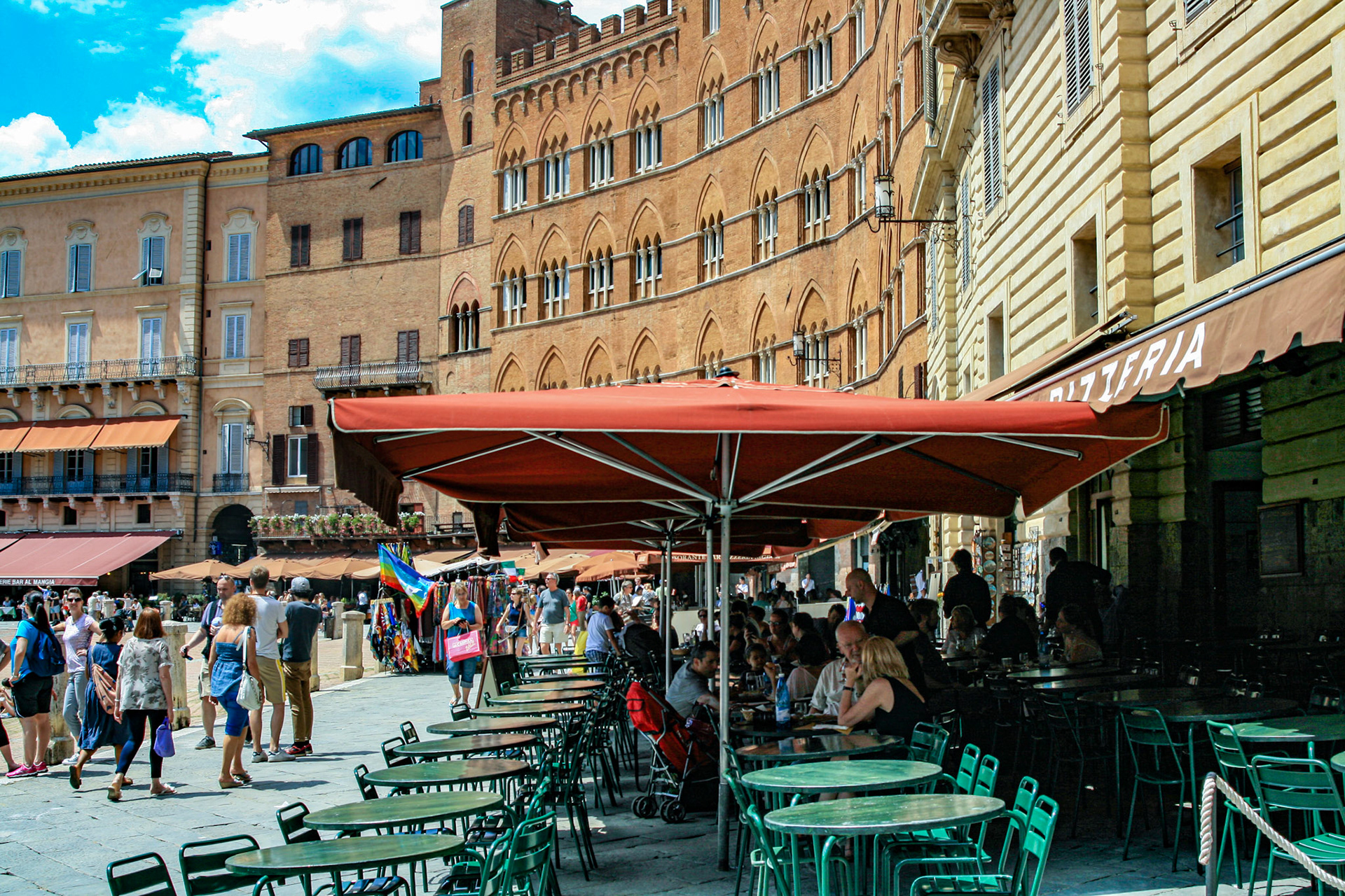 The Piazza del Campo buildings house various cafes and eateries along the edge of the piazza.