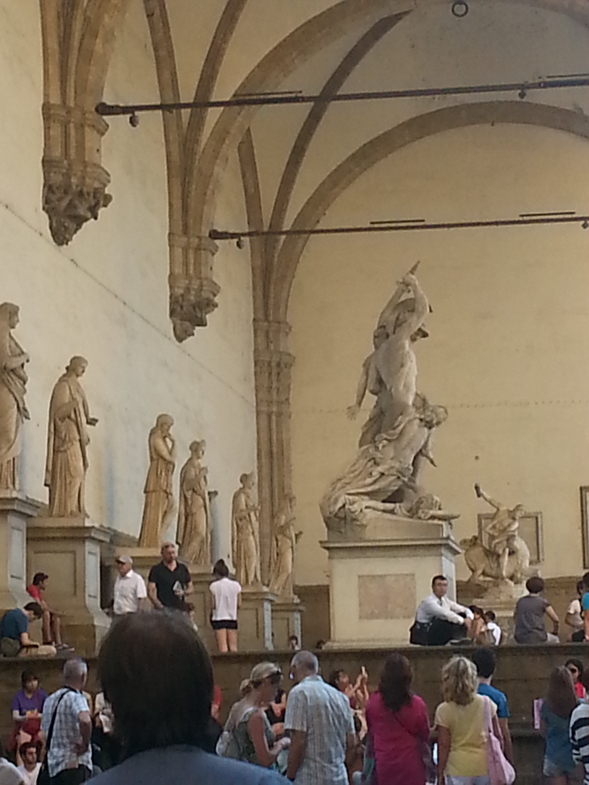 e graceful Loggia dei Lanzi, which sits to the right of Palazzo Vecchio and functions as an open-air sculpture gallery, was designed by Orcagna in 1376. Its curved arches foretell Renaissance classicism. 