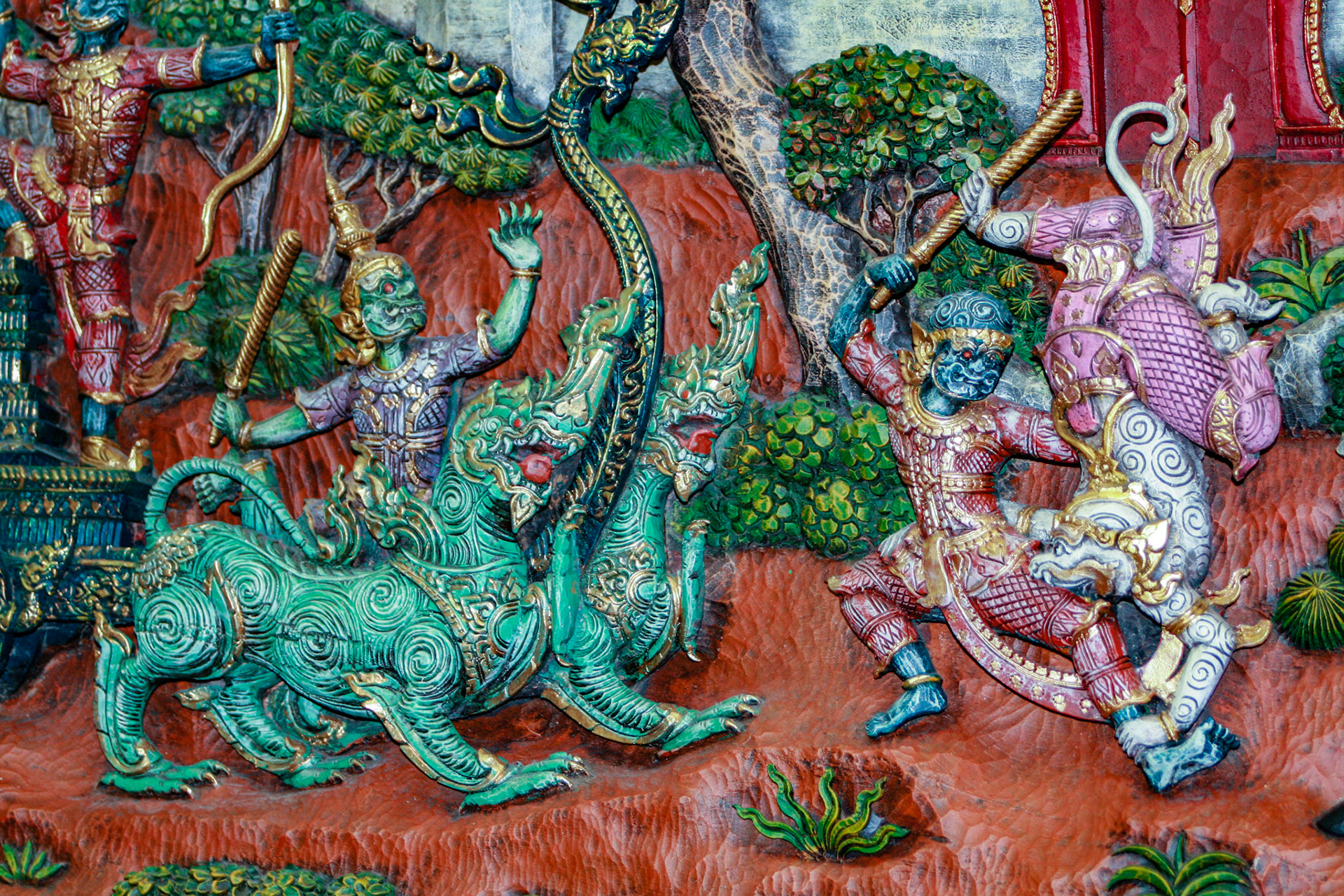 Wood carving at a Teakwood art factory.