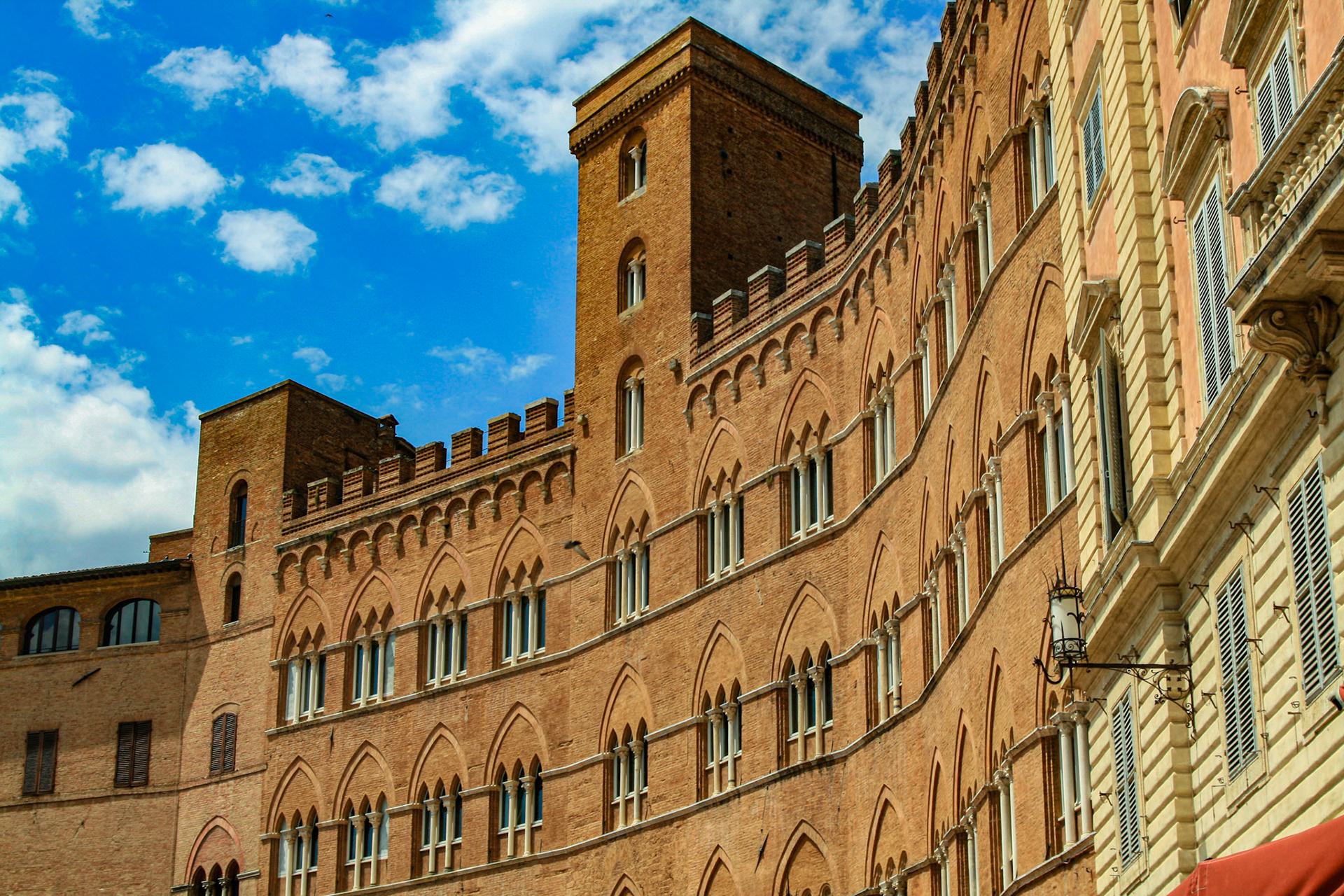 Palazzo Sansedoni is a Gothic style urban palace and tower, whose concave facade is situated facing the Palazzo Pubblico across the Piazza del Campo 