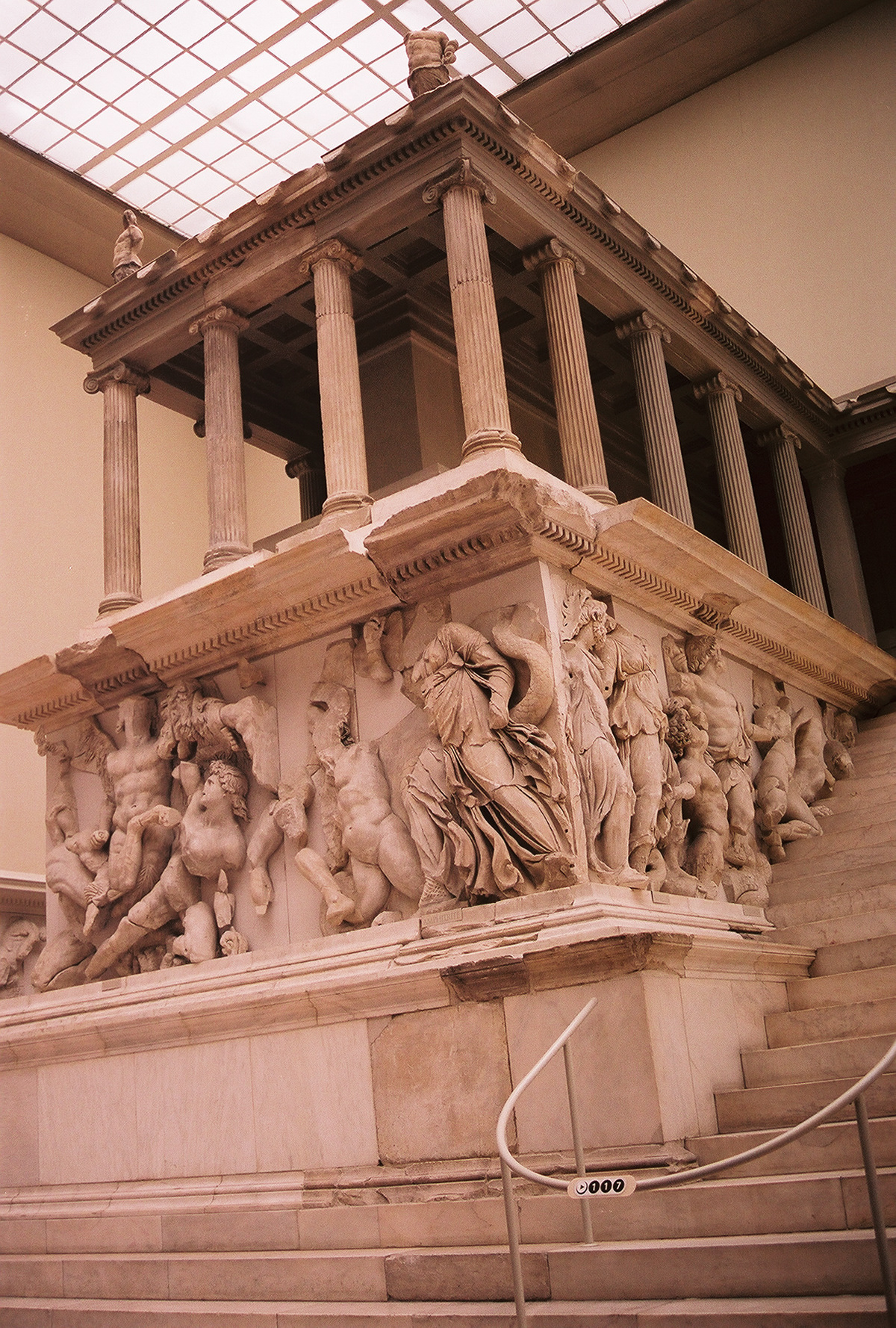 Pergamon Altar - The base is decorated with a frieze in high relief showing the battle between the Giants and the Olympian gods known as the Gigantomachy.