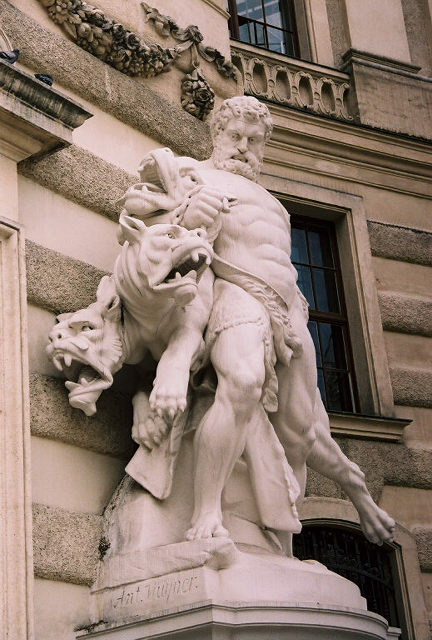 Hercules is capturing Cerberus and completeing his twelfth labor.