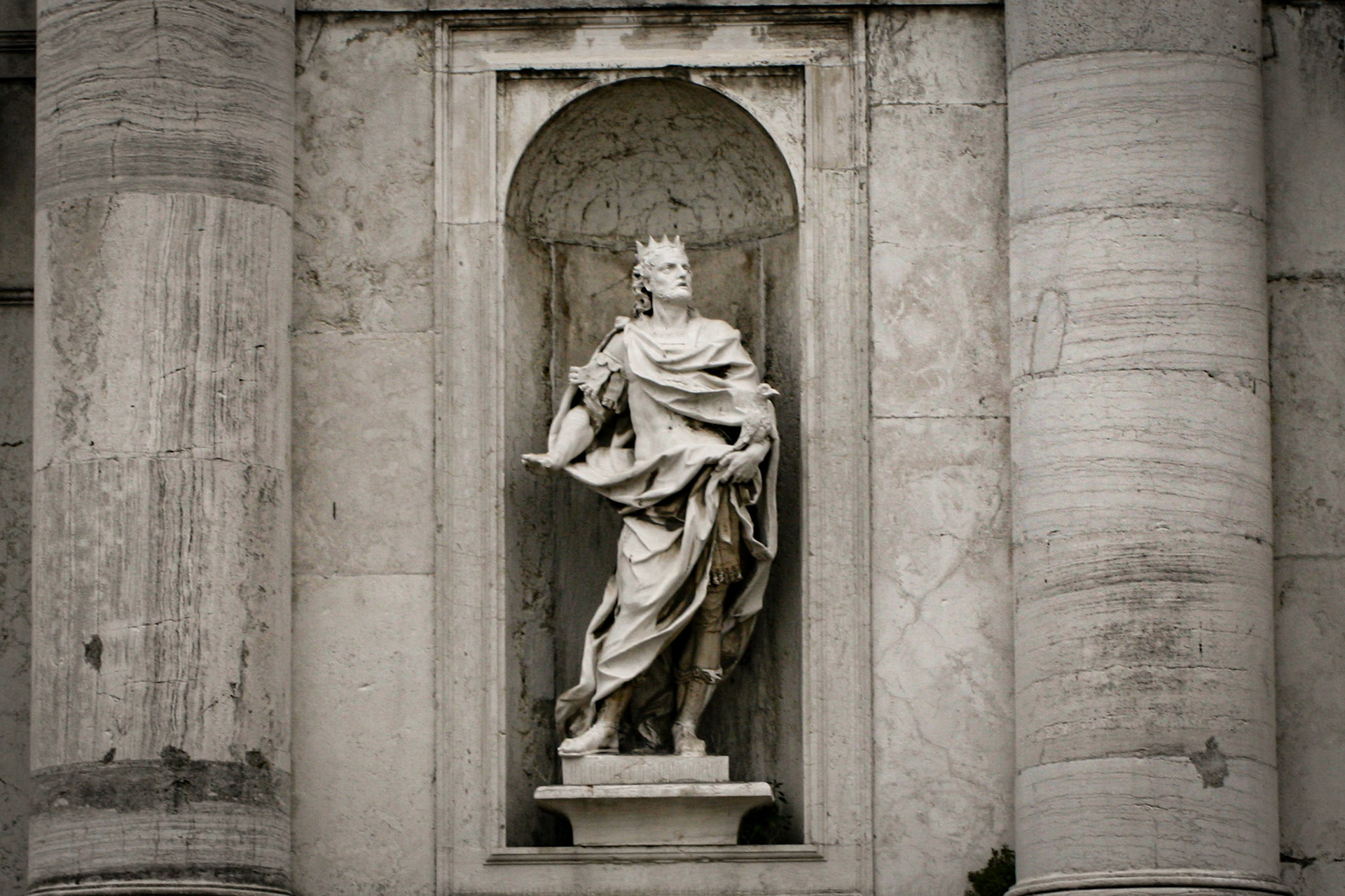 Stone carved statue of Saint Eustace. Facade of San Stae church, overlooking the Grand Canal in Venice. St Eustace was a Roman army commander who became a Christian martyr.