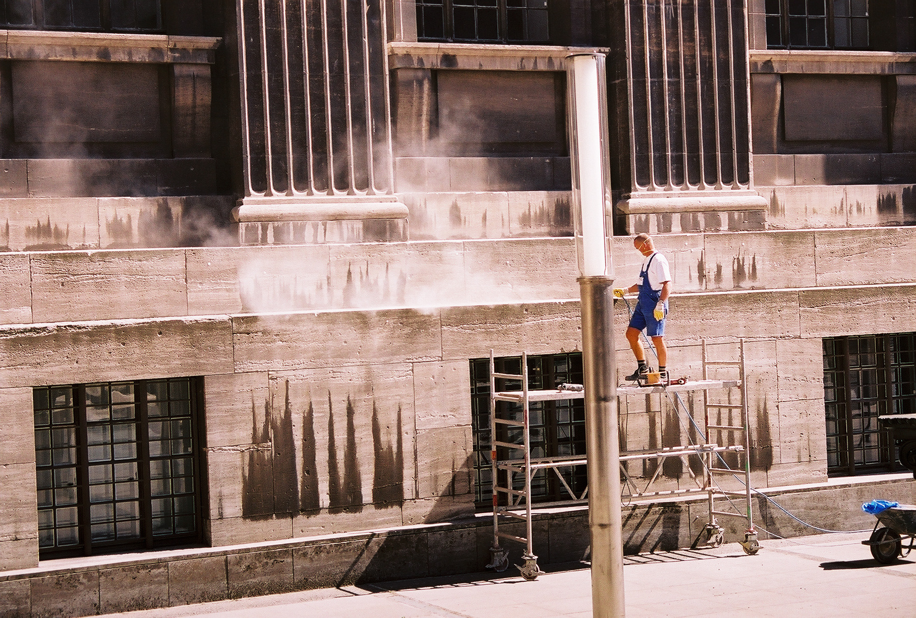 Worker sandblasts The Pergamon Museum 