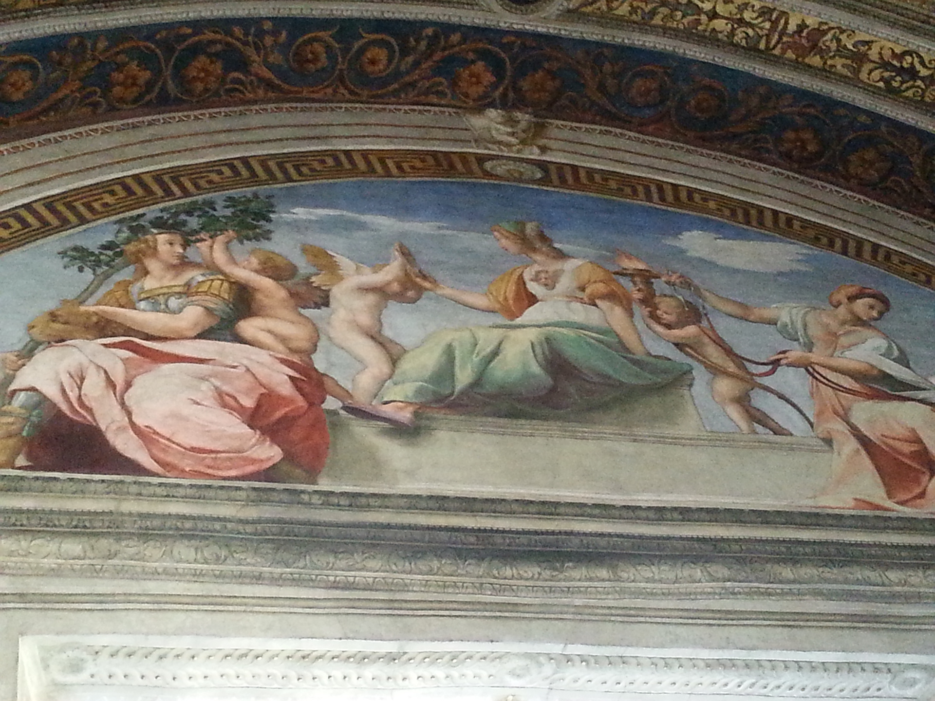 The Cardinal and Theological Virtues is a lunette fresco by Raphael found on the south wall of the Stanza della Segnatura in the Apostolic Palace of the Vatican. Three of the cardinal virtues are personified as statuesque women seated in a bucolic landscape and the theological virtues are depicted by putti. The fresco was a part of Raphael's commission to decorate the private apartments of Pope Julius II. These rooms are now known as the Stanze di Raffaello. After completing his three monumental frescoes Disputation of the Holy Sacrament, The Parnassus, and The School of Athens in the Stanza della Segnatura, Raphael painted the Cardinal and Theological Virtues in 1511. 