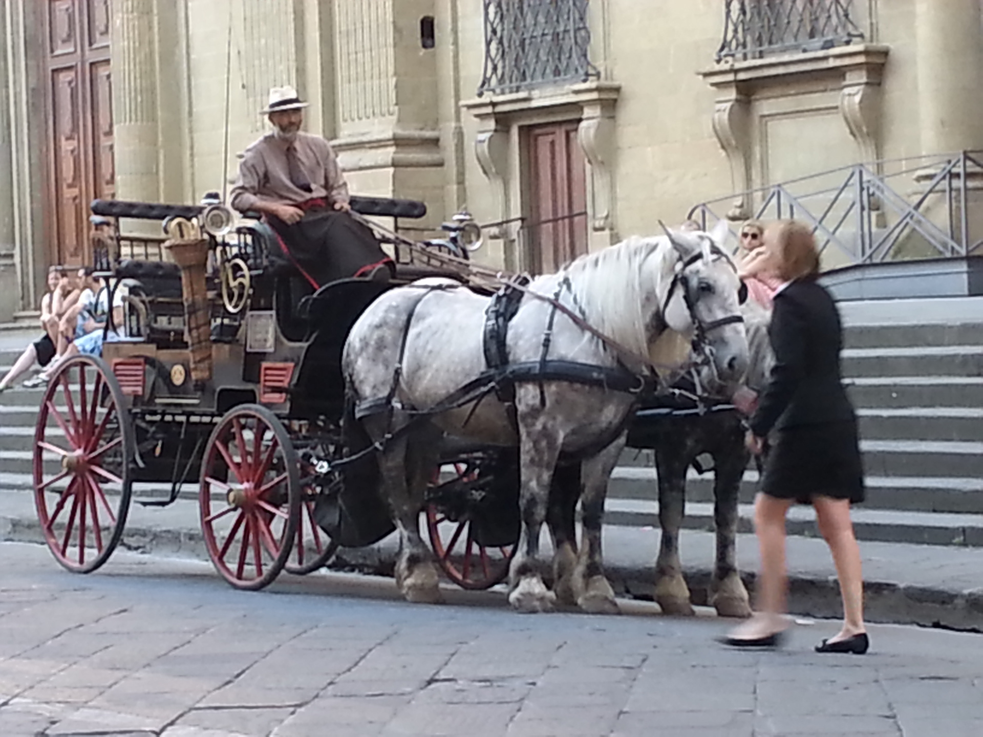 Horse drawn carraige in the Piazza di San Firenze (Florence) in Florence, Italy 