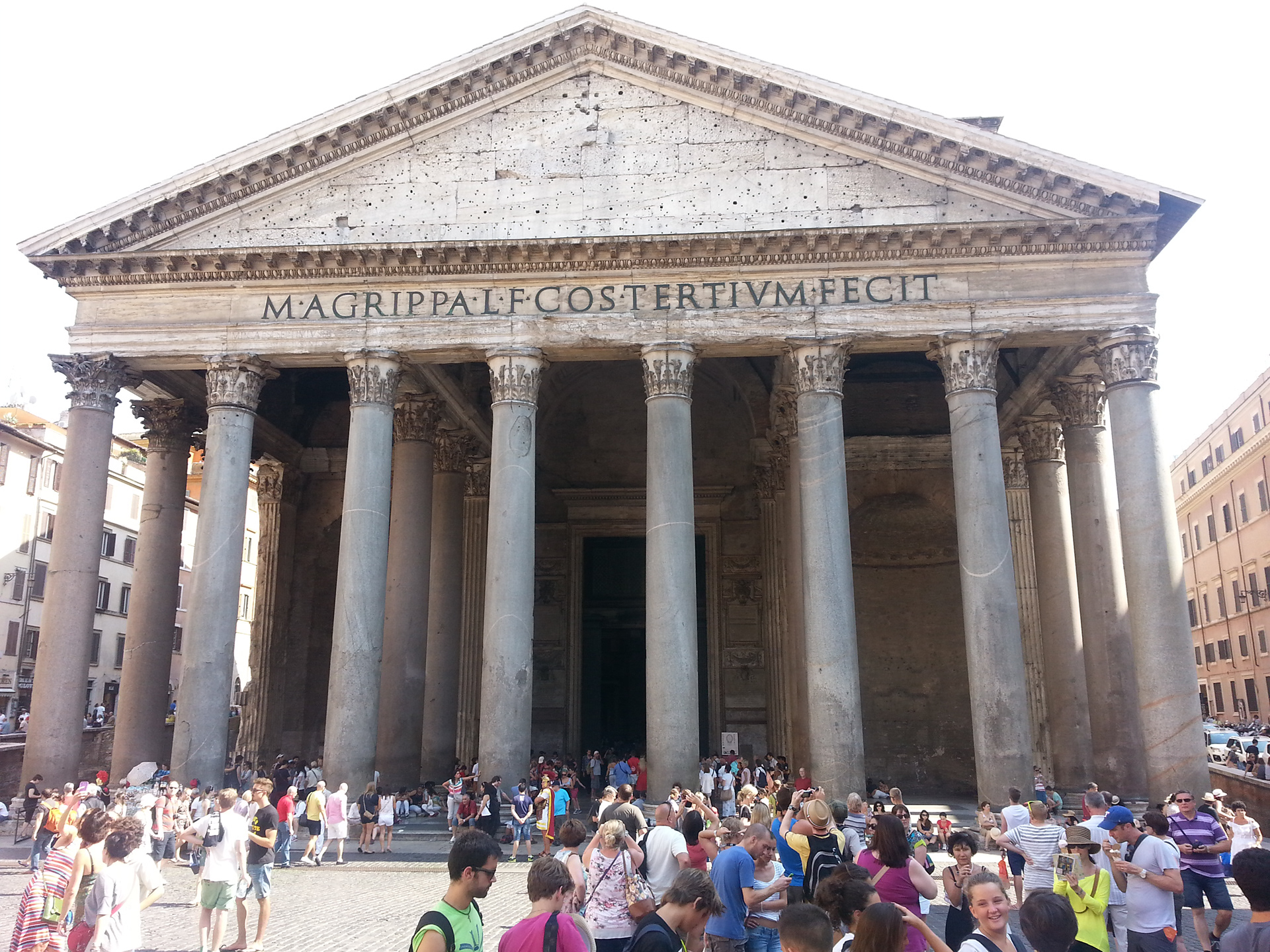 The building is cylindrical with a portico of large granite Corinthian columns (eight in the first rank and two groups of four behind) under a pediment. A rectangular vestibule links the porch to the rotunda, which is under a coffered concrete dome, with a central opening (oculus) to the sky. 
