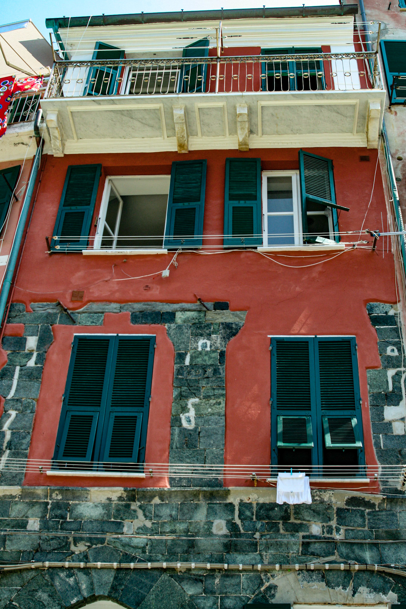 Stepping off the train in Vernazza, visitors are instantly dazzled with the collection of colorful buildings and accents that line the main street. 