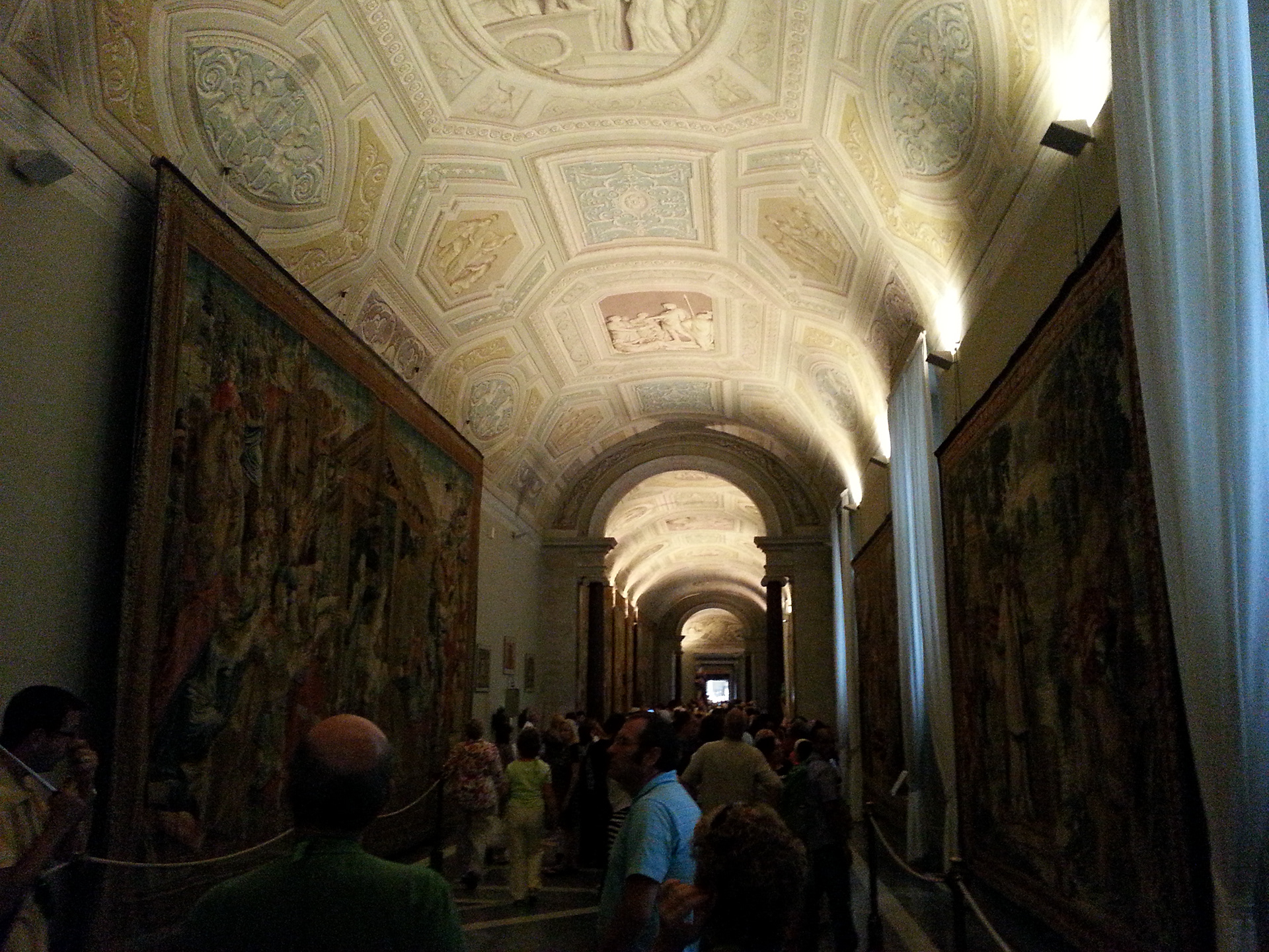 Two hallways that you will pass through on your way to the Sistine Chapel are the Tapestries Hall (with 17th-century weavings based on drawings by Raphael) and the Map Hall. 