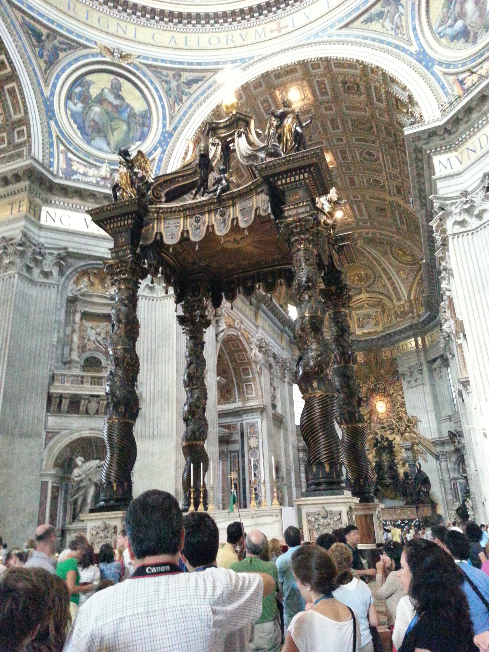 St. Peter's Baldachin (Italian: Baldacchino di San Pietro, L'Altare di Bernini) is a large Baroque sculpted bronze canopy, technically called a ciborium or baldachin, over the high altar of St. Peter's Basilica in Vatican City. Designed by the Italian artist Gian Lorenzo Bernini, it was intended to mark, in a monumental way, the place of Saint Peter's tomb underneath. Under its canopy is the high altar of the basilica. 