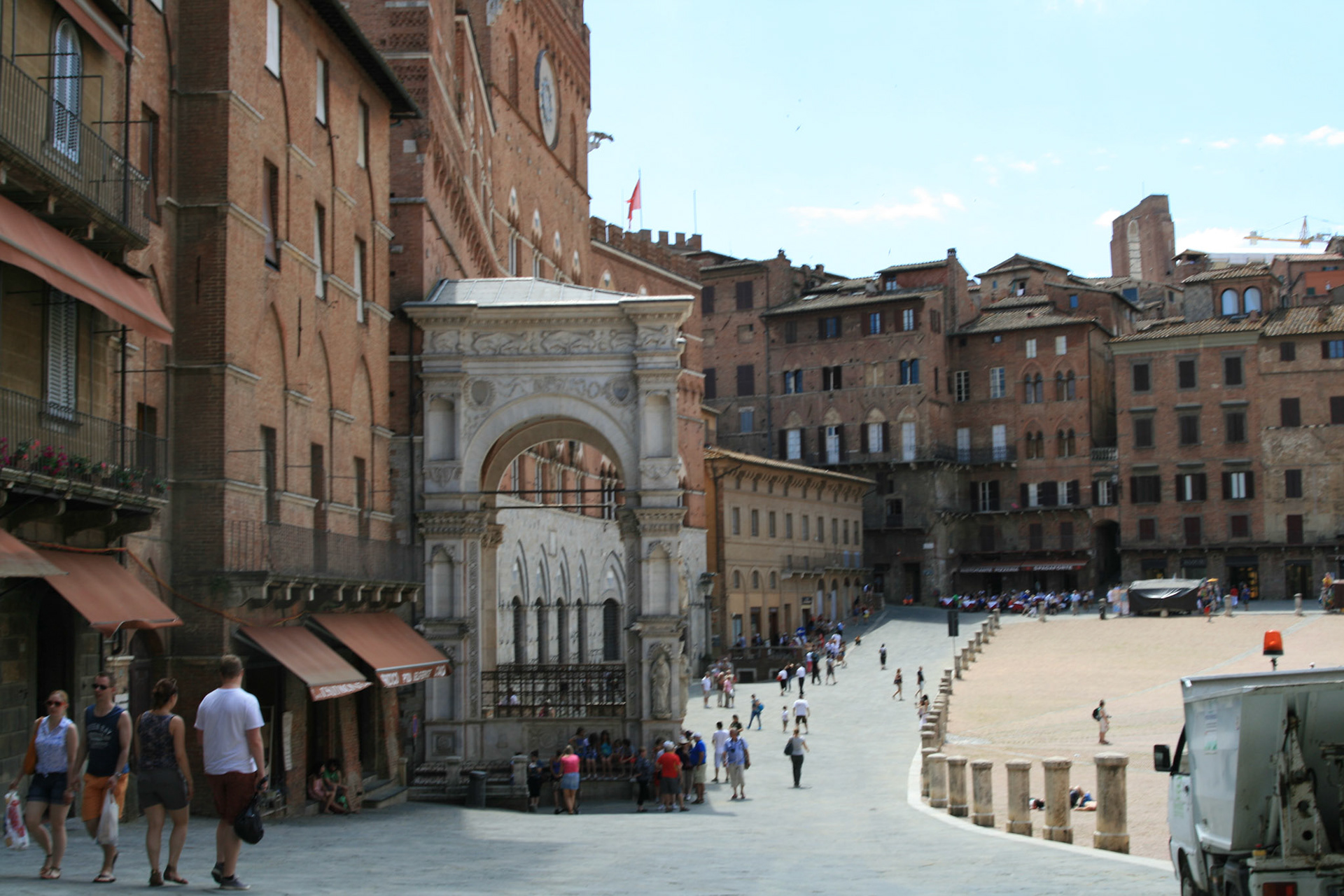Piazza del Campo is the main public space of the historic center of Siena, Tuscany, Italy and is regarded as one of Europe's greatest medieval squares. Beneath the Torre del Mangia and set slightly forwards from the facade of the Palazzo Pubblico stands the Cappella di Piazza, a marble chapel that was put up by the Senese in thanks for the end of the 1348 plague that hit the city and reduced its population to less than 16,000.