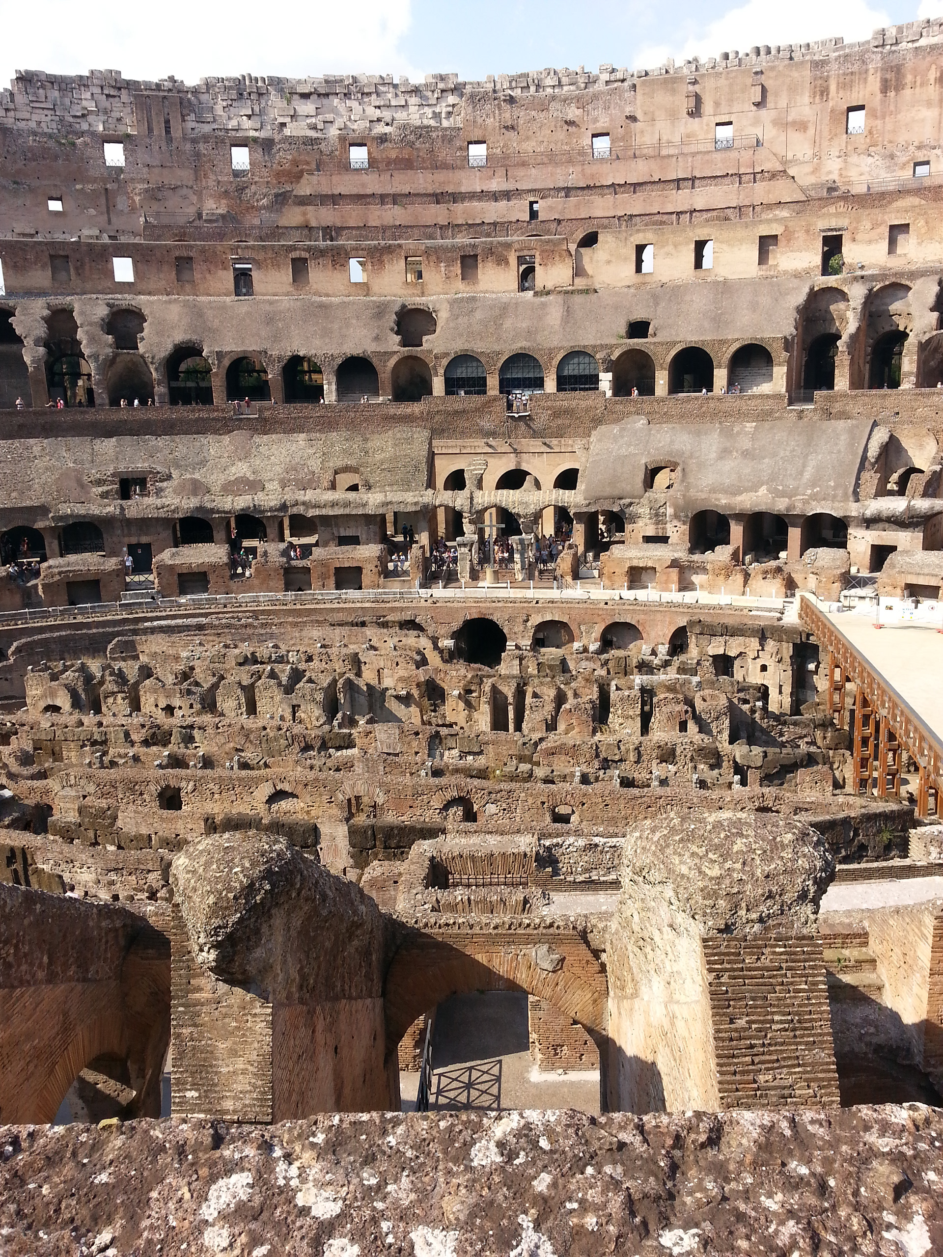 The ground level of the Colosseum is only partially constructed at one end of the amphitheater. Below that level are the chambers where they kept the gladiators and various beasts before the slaughter began. 