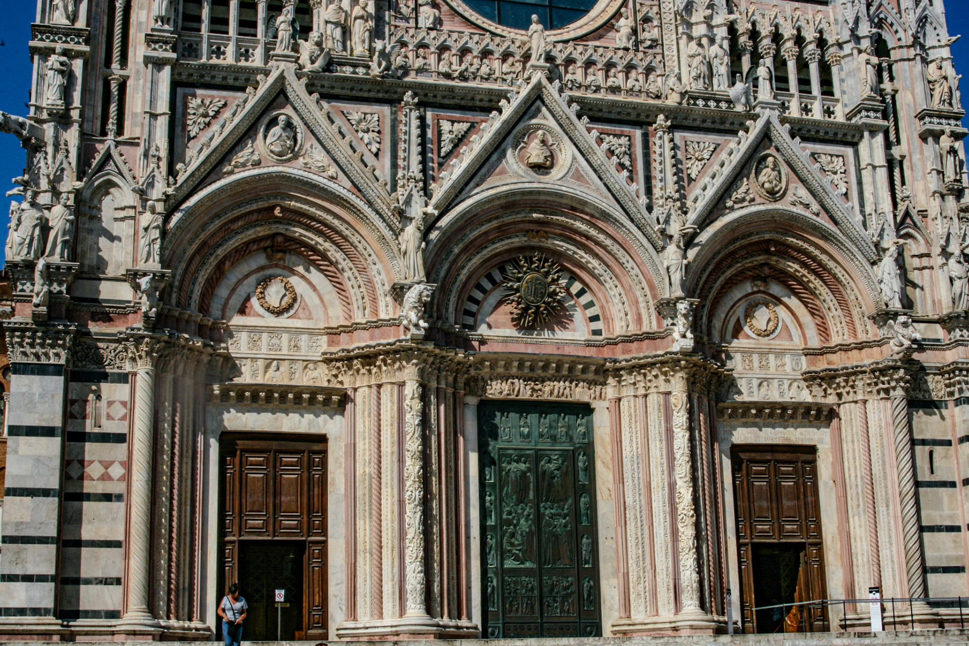 Main entrance - Siena Cathedral (Italian: Duomo di Siena) is a medieval church in Siena, Italy, dedicated from its earliest days as a Roman Catholic Marian church 