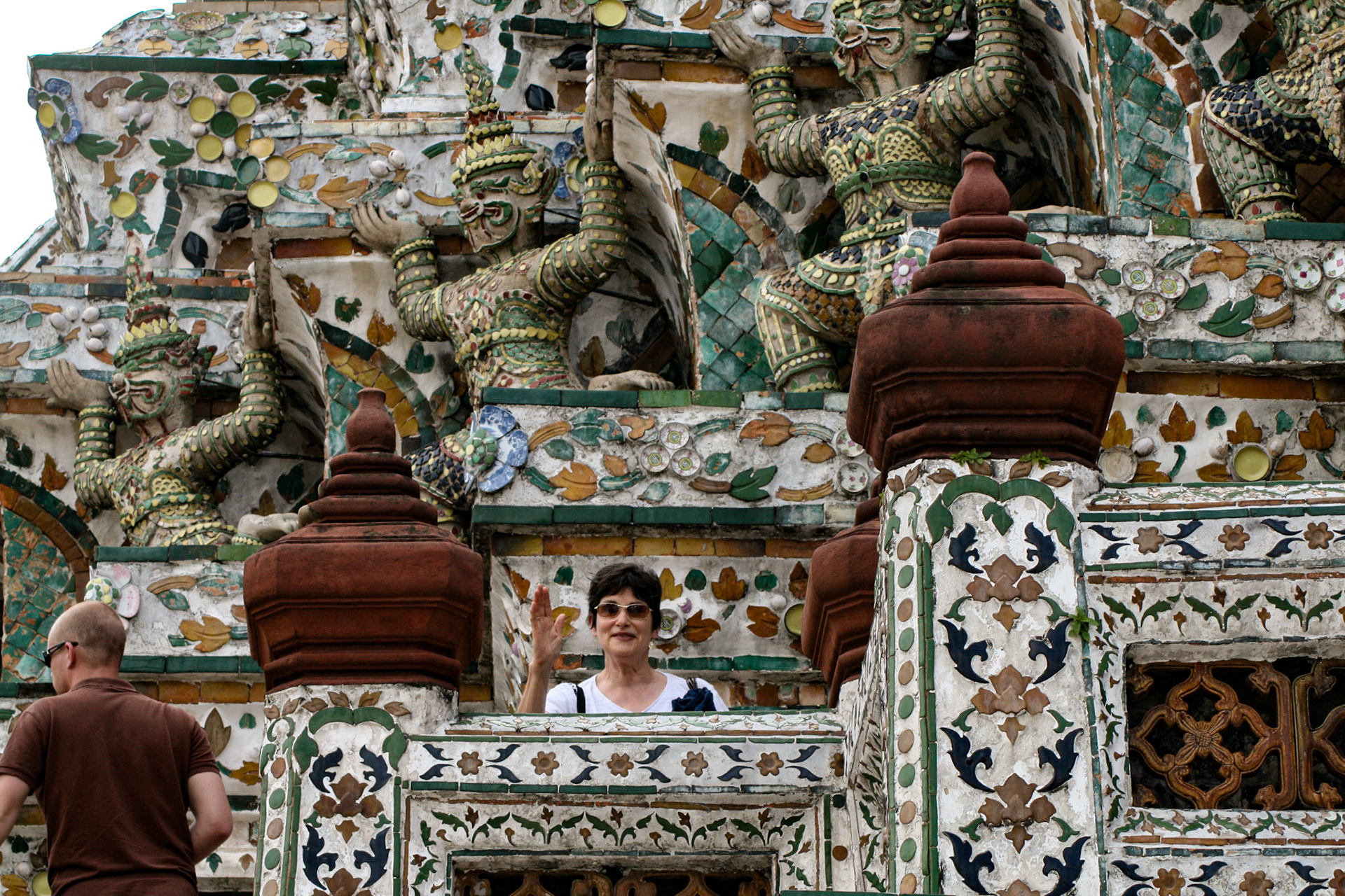 Linda Putnam peeks out from the temple, Wat Arun, Temple of Dawn, Bangkok, Thailand 