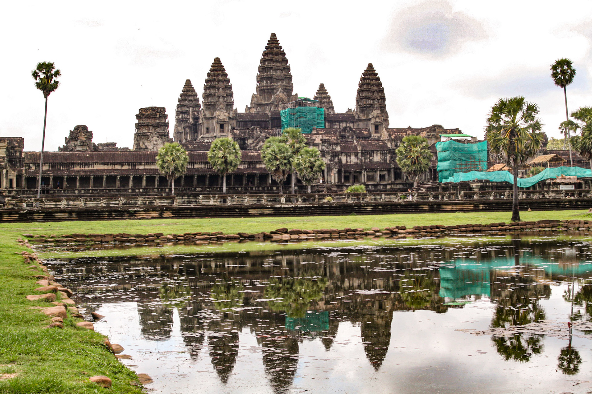 The dominant scheme for the construction of state temples in the Angkorian period was that of the Temple Mountain, an architectural representation of Mount Meru, the home of the gods in Hinduism. Enclosures represented the mountain chains surrounding Mount Meru, while a moat represented the ocean. The temple itself took shape as a pyramid of several levels, and the home of the gods was represented by the elevated sanctuary at the center of the temple. 