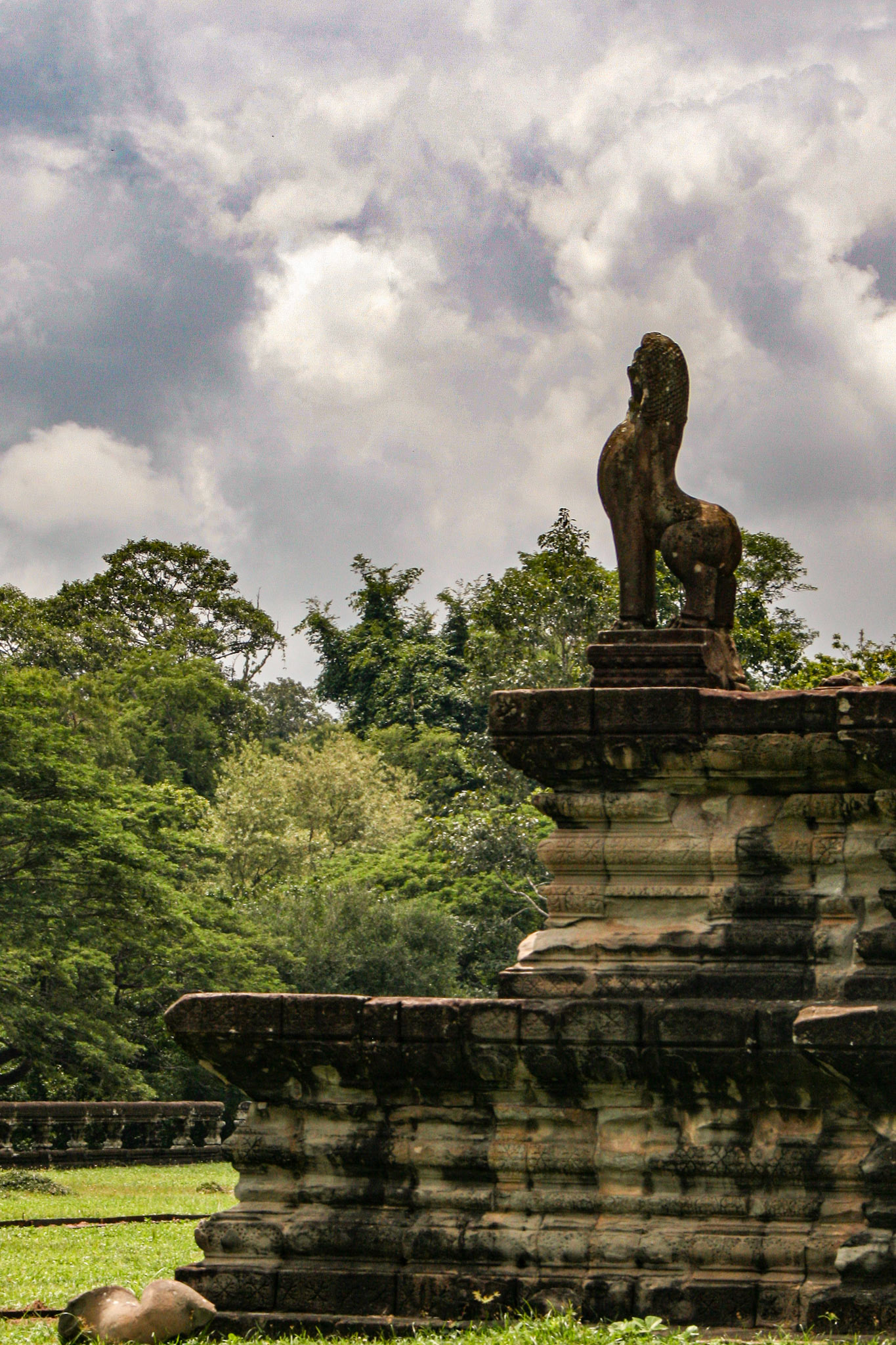 Khmer design elements usually entail sculptures of nagas (snakes) and lions flanking the various causeway entrances, well-turned window balusters, and intricately carved surfaces 