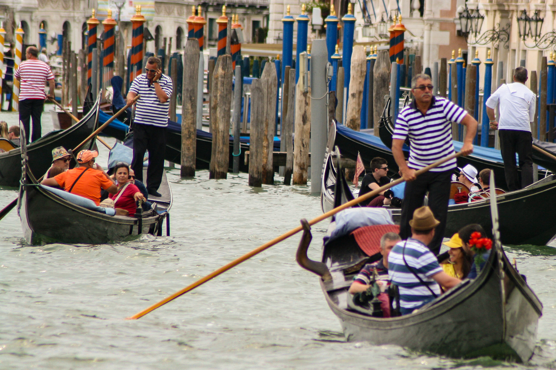 A busy day for Gondoliers on the Grand Canal. - Venice