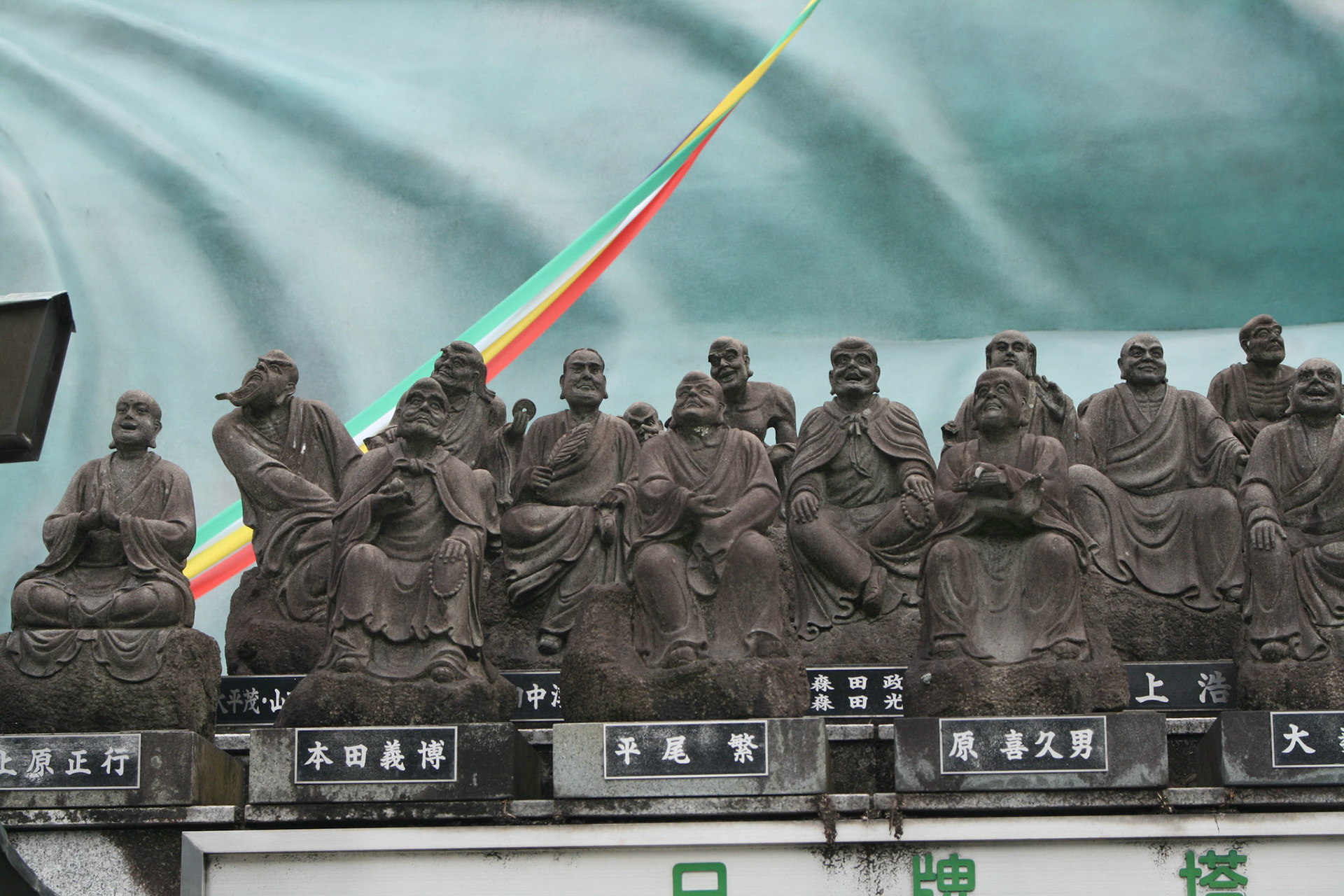 On the hill below the reclining figure are 500 statues of various disciples, each with a distinct posture and facial expression. A ribbon from Buddha’s left hand runs the length of the pathway leading up to the statue.  