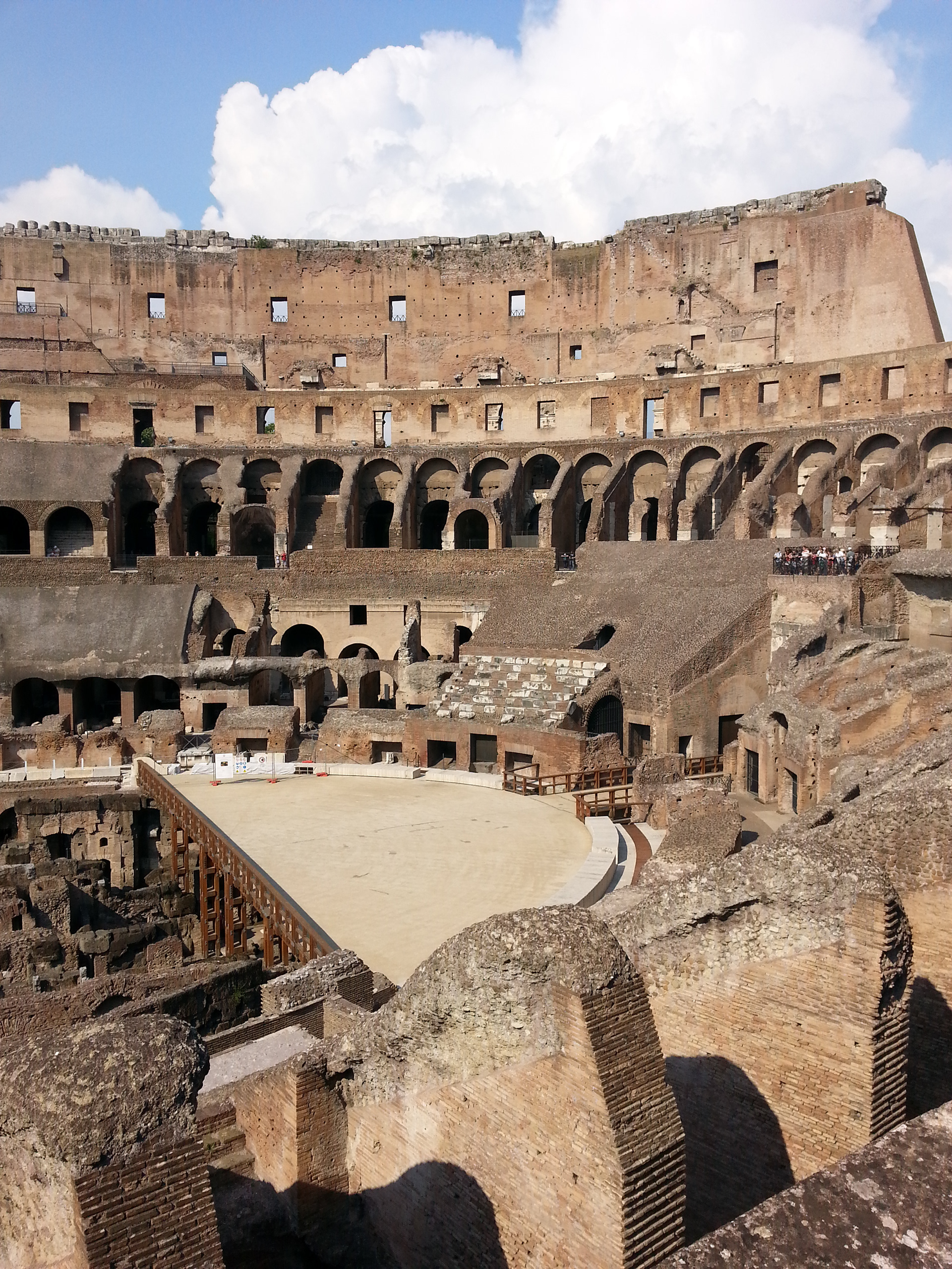 The ground level of the Colosseum is only partially constructed at one end of the amphitheater. Below that level are the chambers where they kept the gladiators and various beasts before the slaughter began. 