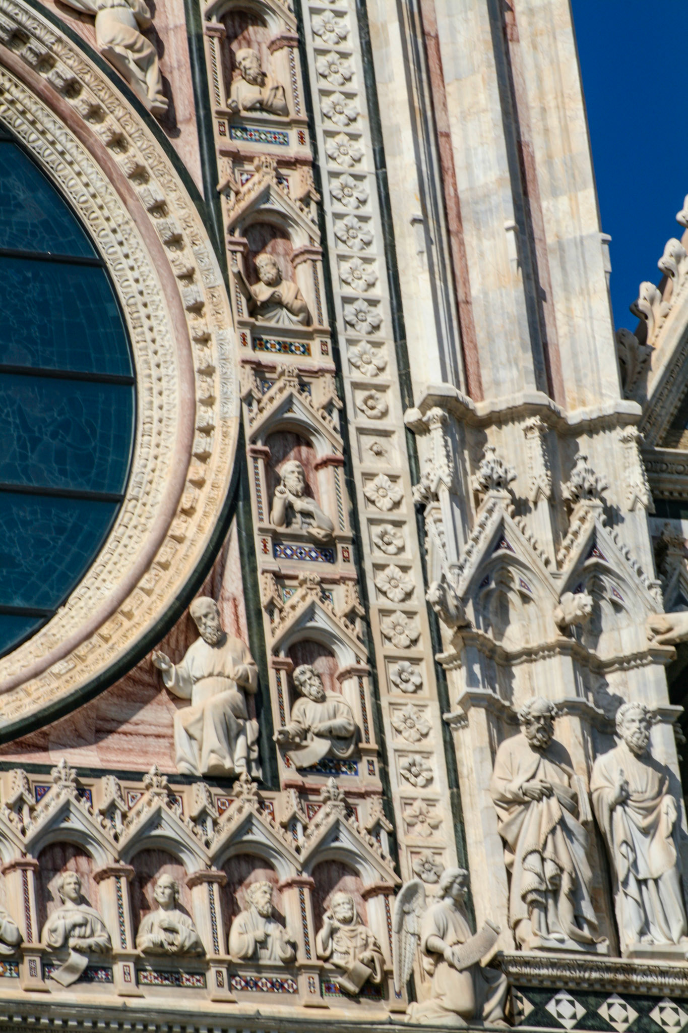 Facade detail of Duomo di Siena (Siena Cathedral), Siena, Tuscany, Italy 