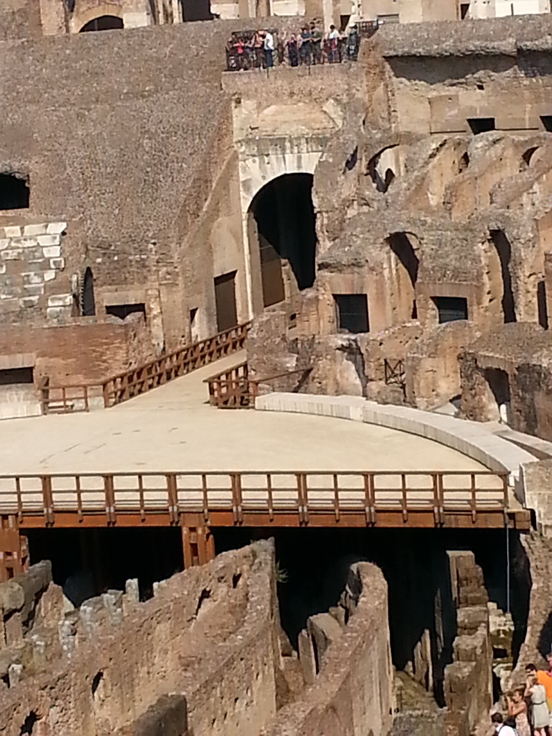 The ground level of the Colosseum is only partially constructed at one end of the amphitheater. Below that level are the chambers where they kept the gladiators and various beasts before the slaughter began. 
