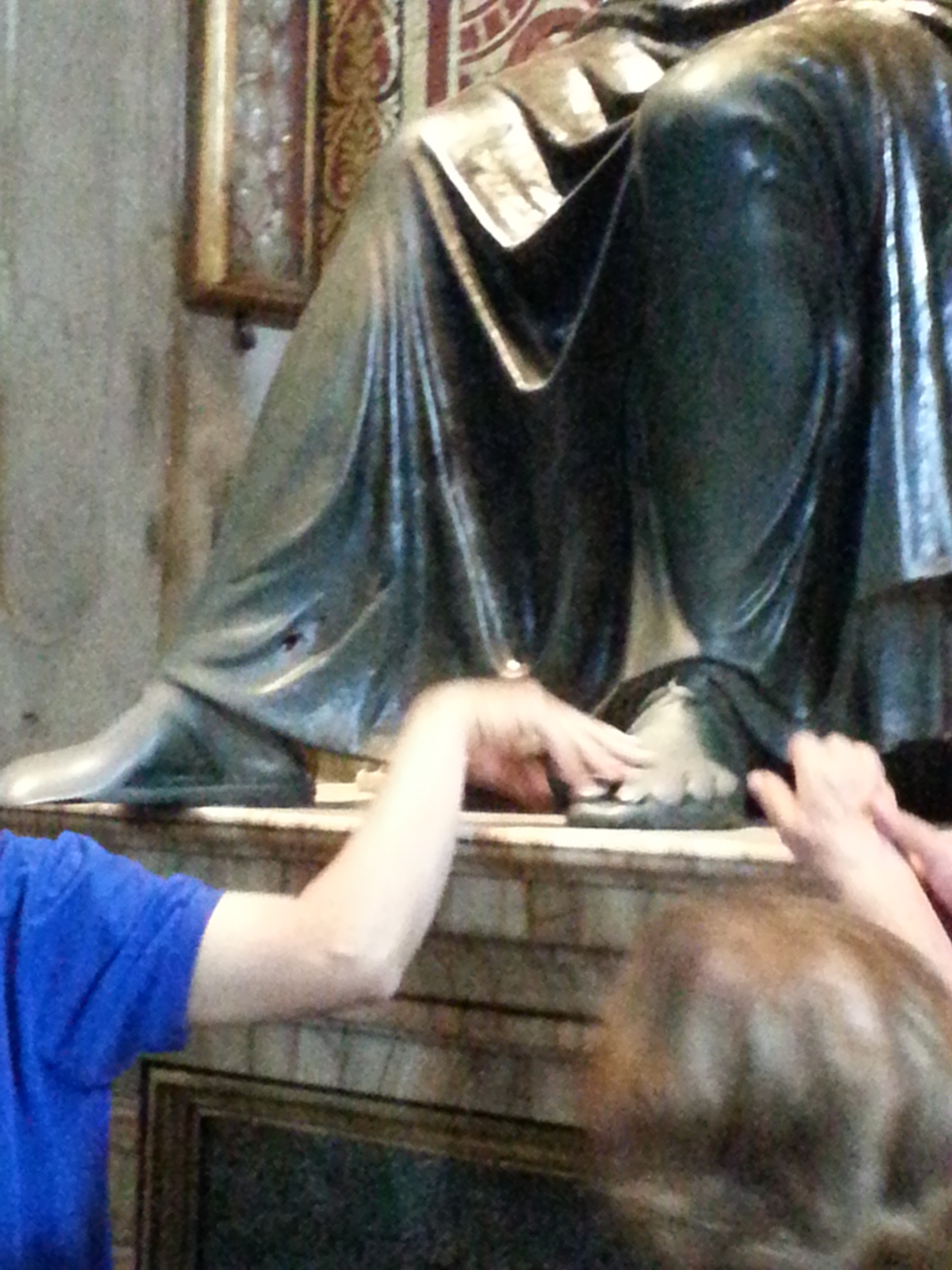 The right foot of this statue in St. Peter's Basilica has been rubbed by visitors' hands praying for wisdom for over 700 years! 