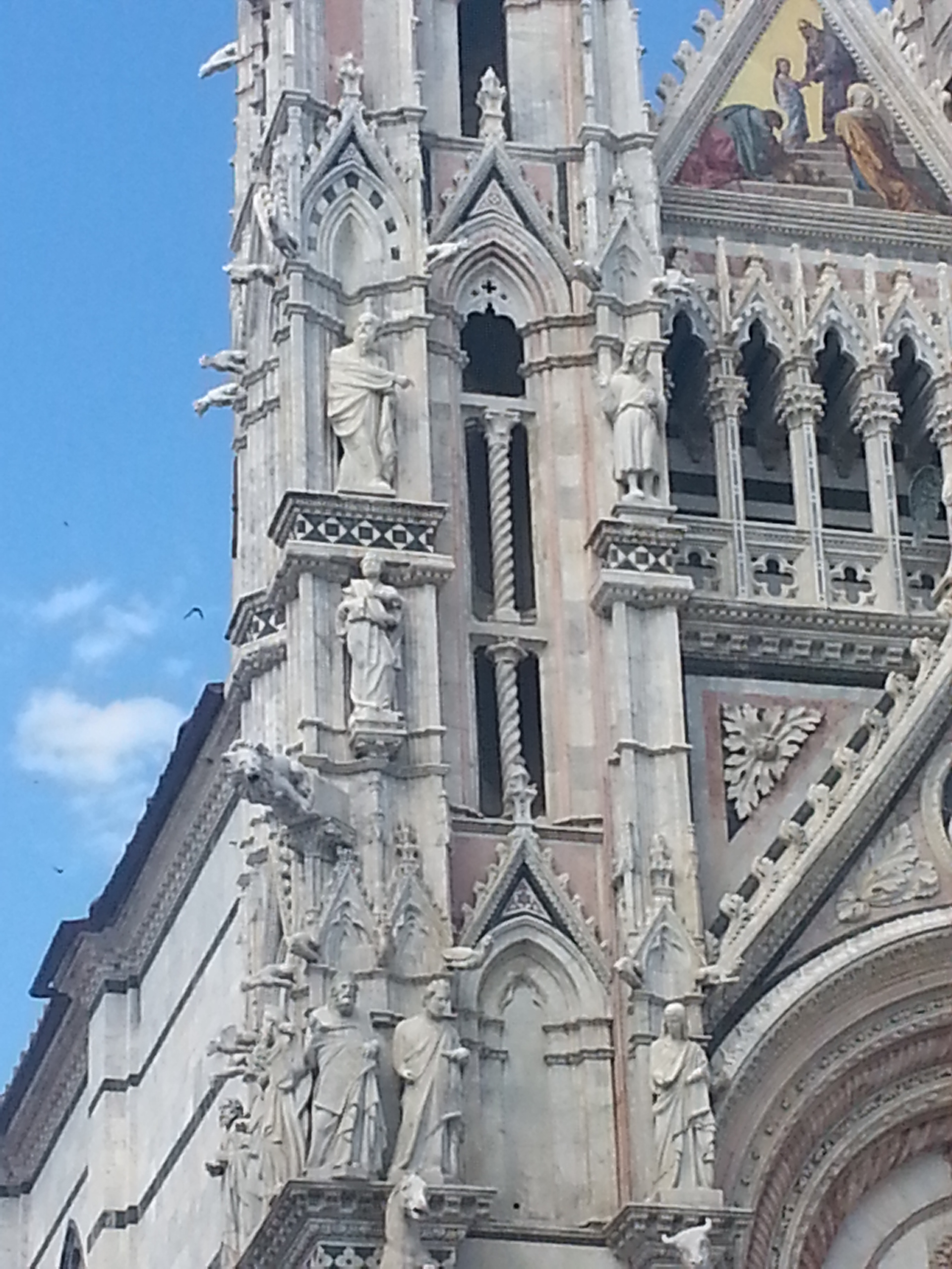 Facade detail of Duomo di Siena (Siena Cathedral), Siena, Tuscany, Italy 