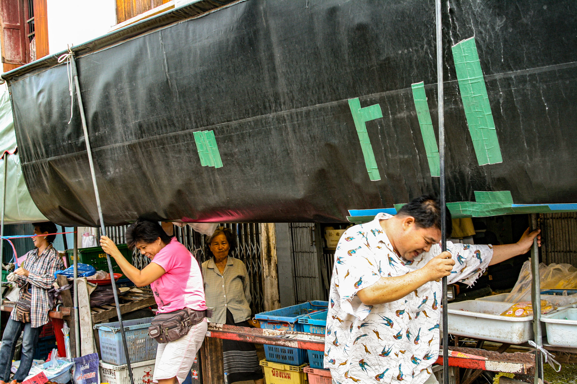 One minute you see the locals shopping for their vegetables and the next, vendors scoop up their baskets and boxes and anything that lies over the track.