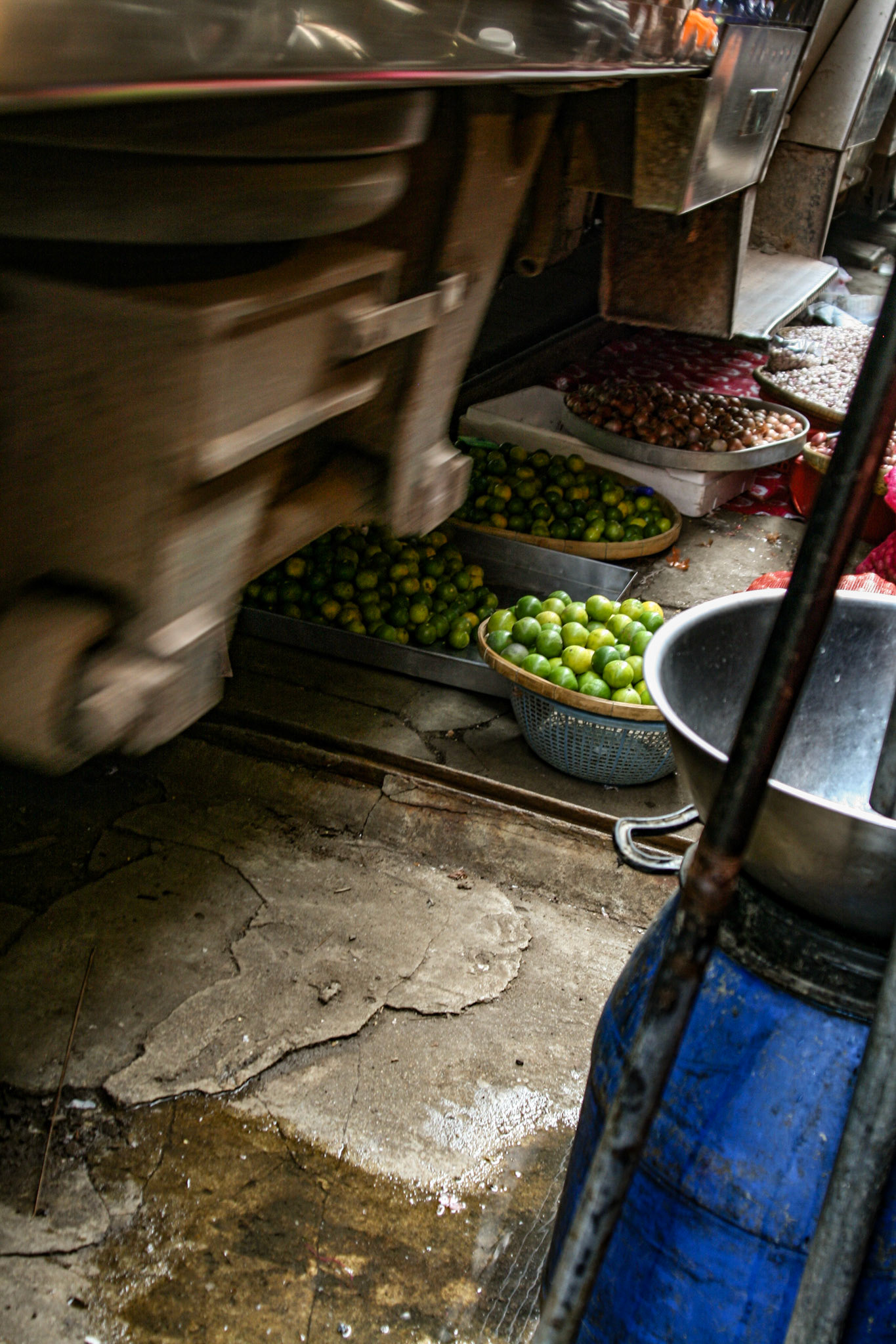 The train creeps by and brushes over any items left that just have enough clearance to avoid contact.