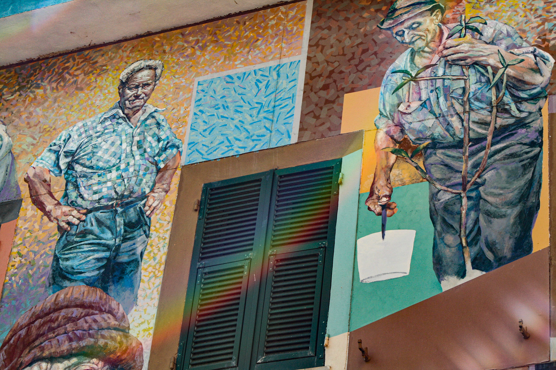 Murals of the painter Silvio Benedetto in Riomaggiore, Italy 