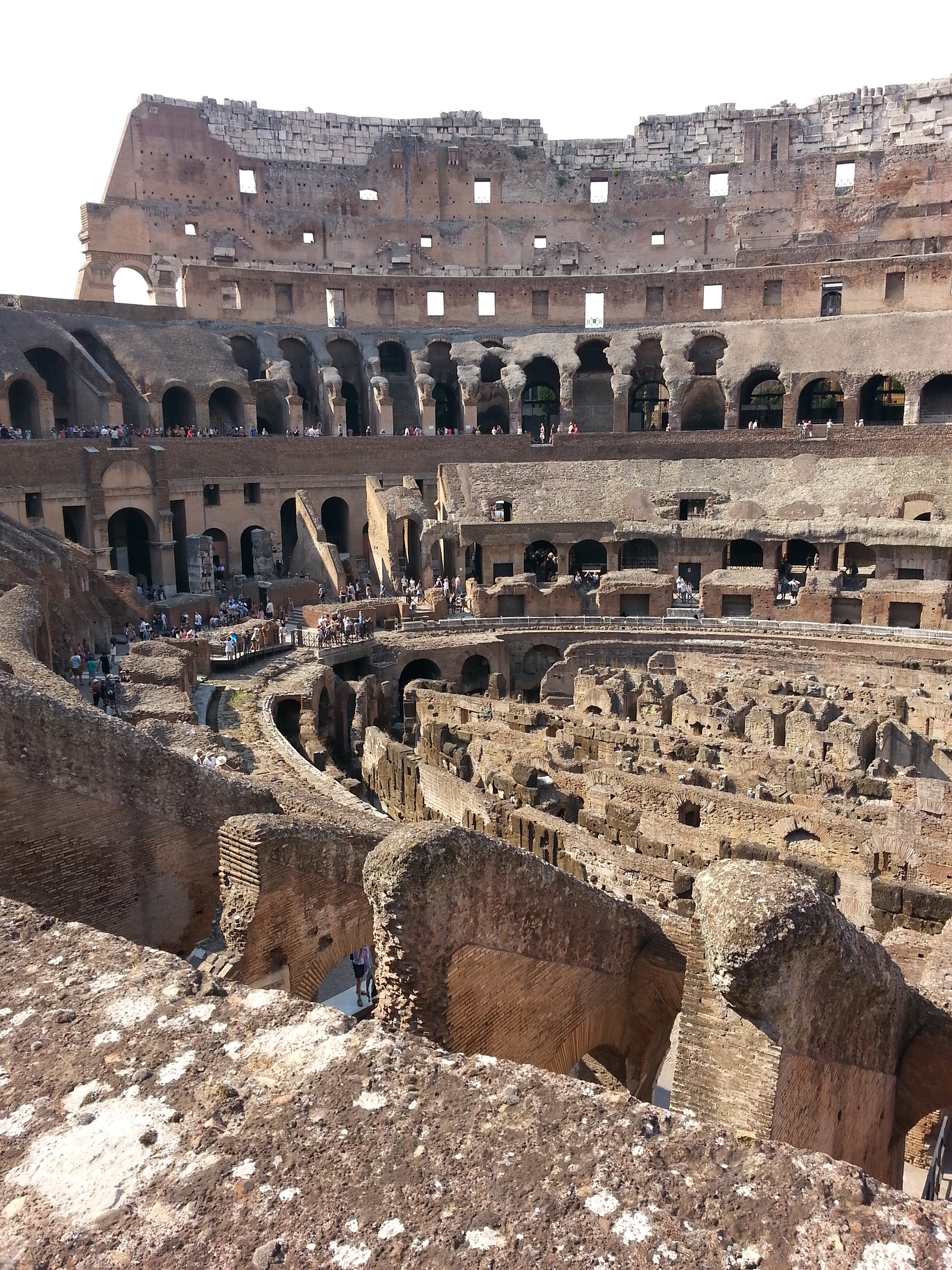 The ground level of the Colosseum is only partially constructed at one end of the amphitheater. Below that level are the chambers where they kept the gladiators and various beasts before the slaughter began. 