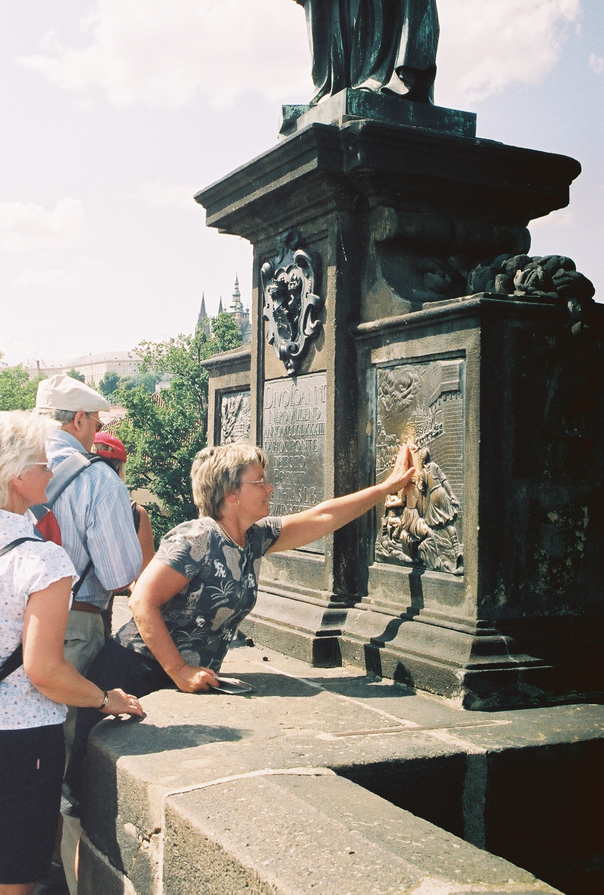 Plaque under St. John of Nepomuk Statue on Charles Bridge