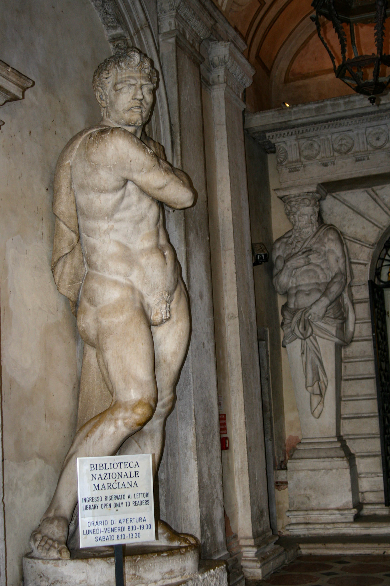 One of two statues decorating the entrance of Marciana Library - Venice 