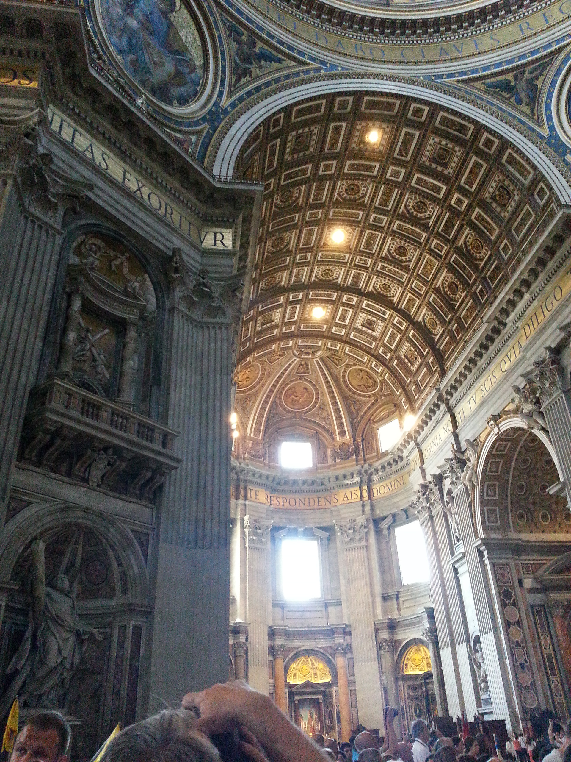The baldachin acts as a visual focus within the basilica; it is itself a very large structure and forms a visual mediation between the enormous scale of the building and the human scale of the people officiating at the religious ceremonies at the papal altar beneath its canopy. 