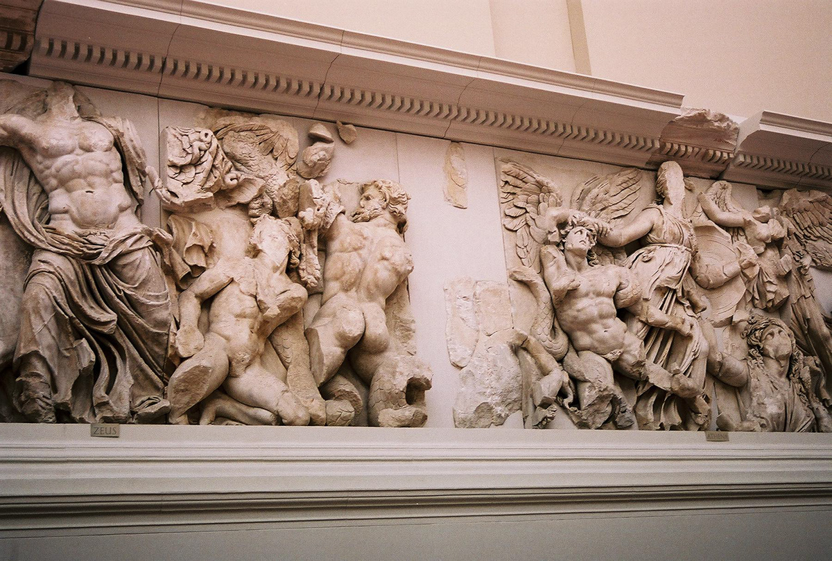 Pergamon Altar - The base is decorated with a frieze in high relief showing the battle between the Giants and the Olympian gods known as the Gigantomachy.