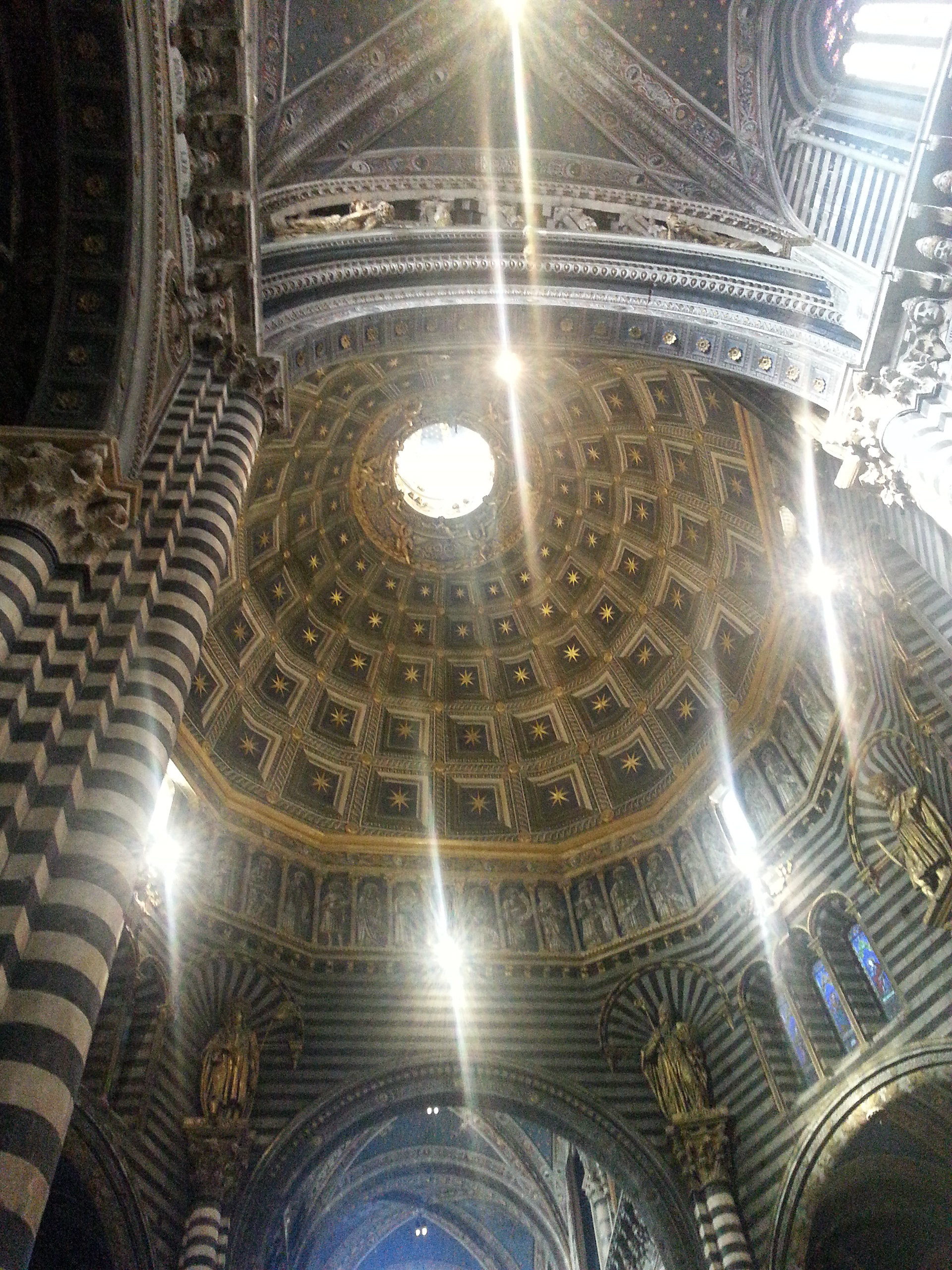 The dome in the interior of Siena Cathedral, Siena, Tuscany Italy Europe 