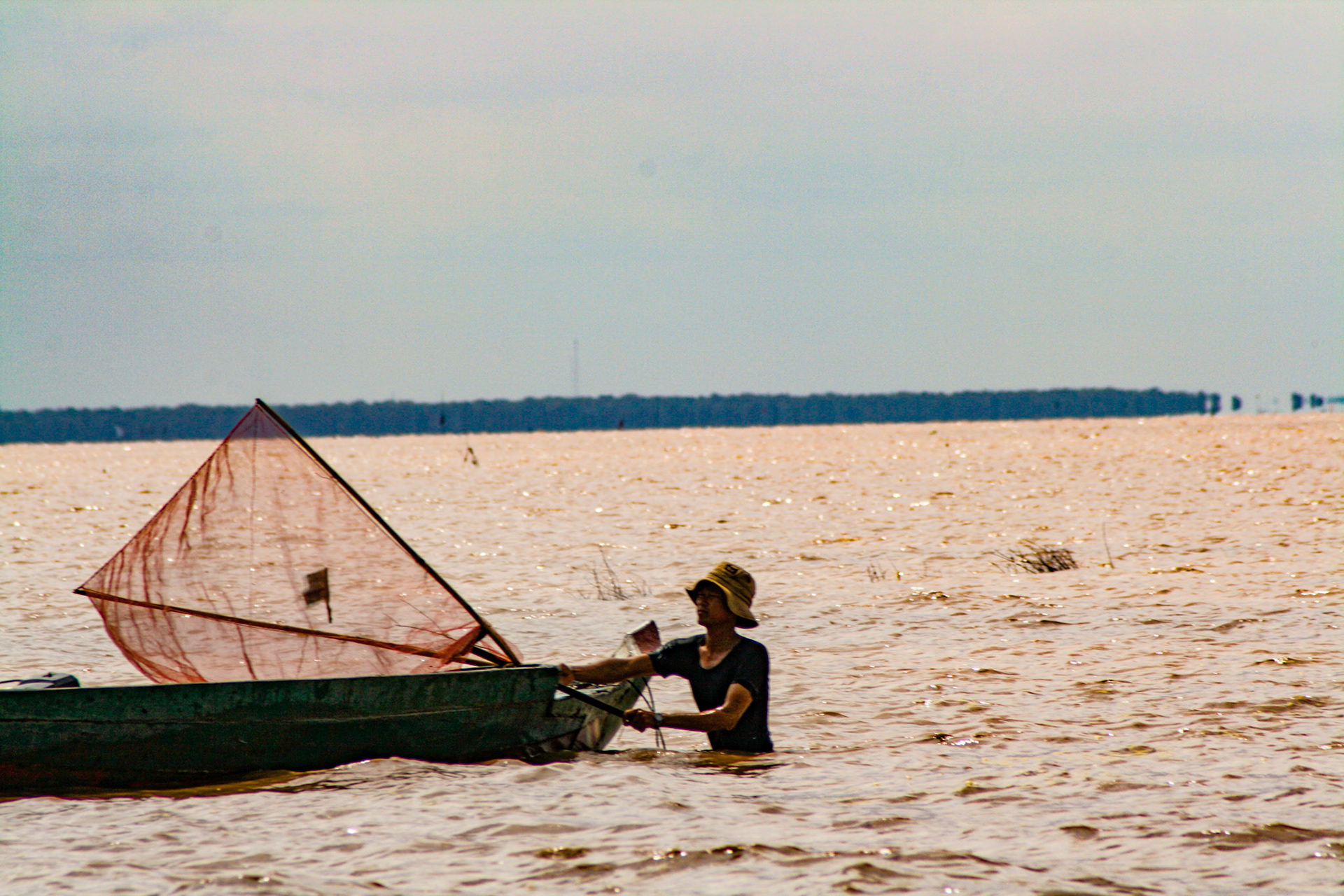 Tonlé Sap Lake, the largest freshwater body in Southeast Asia, supports a large carp-breeding and carp-harvesting industry, with numerous floating fishing villages inhabited largely by ethnic Vietnamese.