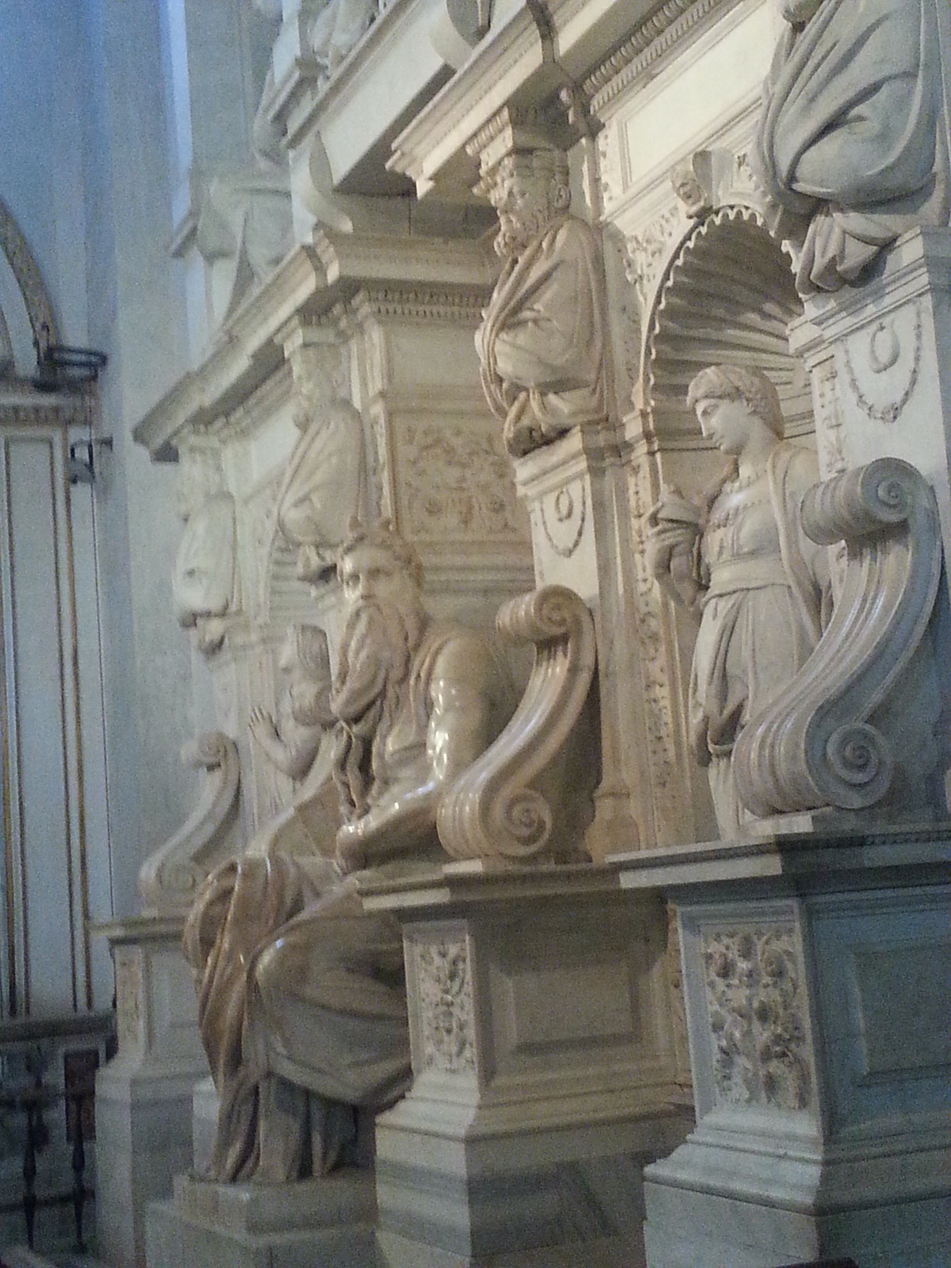 Moses (Italian: Mosè c. 1513–1515) is a sculpture by the Italian High Renaissance artist Michelangelo Buonarroti, housed in the church of San Pietro in Vincoli in Rome. Commissioned in 1505 by Pope Julius II for his tomb, it depicts the biblical figure Moses with horns on his head, based on a description in chapter 34 of Exodus in the Vulgate, the Latin translation of the Bible used at that time. 