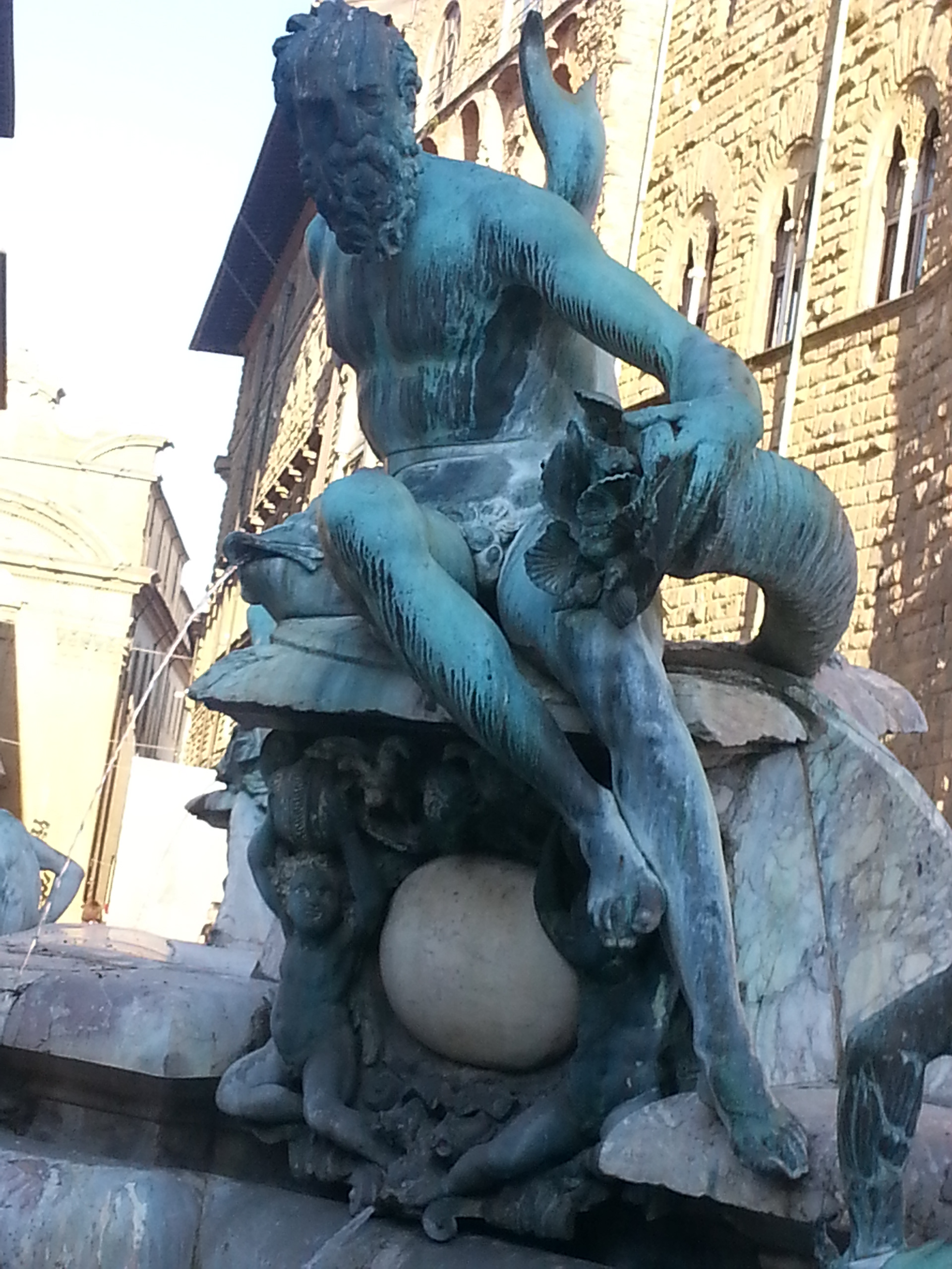 Bronze statue of a satyr, detail of Neptune Fountain in Florence, situated on the Piazza della Signoria, sculptor Bartolomeo Ammannati 1563-1565. 