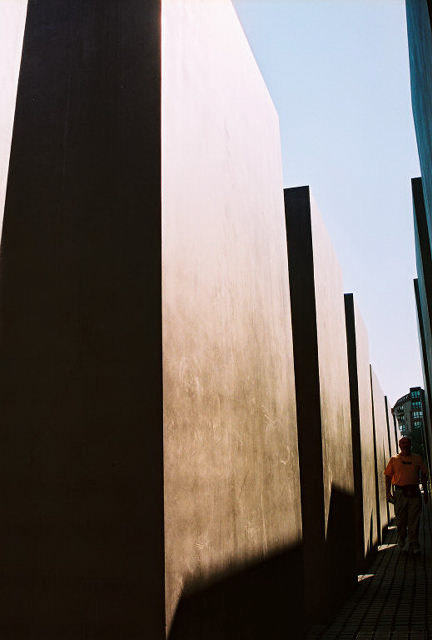 The narrow alleys and undulating ground, along with the gradual increase in height of the slabs as one enters the memorial, gives the impression of a gradual engulfing into an eventuality that is all too overwhelming. 