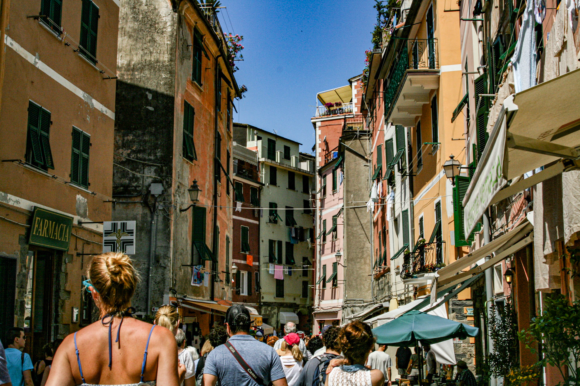 Stepping off the train in Vernazza, visitors are instantly dazzled with the collection of colorful buildings and accents that line the main street. 