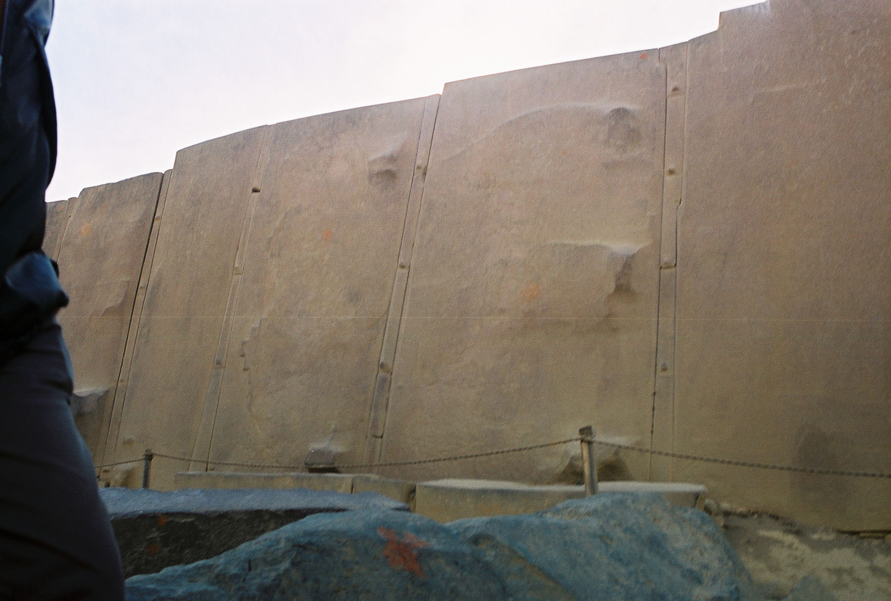 The work was done by laborers from elsewhere who used ramps, rollers, and manpower.