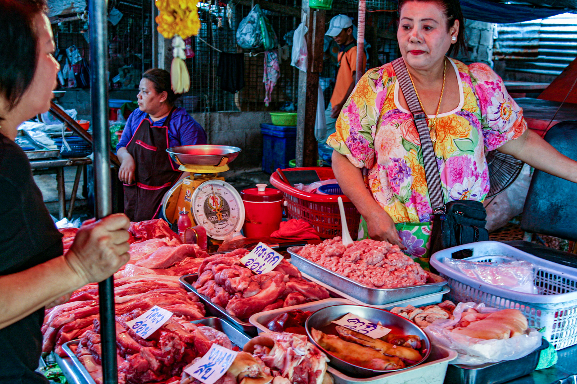 Shoppers make their way through and around the various vendors picking up whatever is needed for the day. 