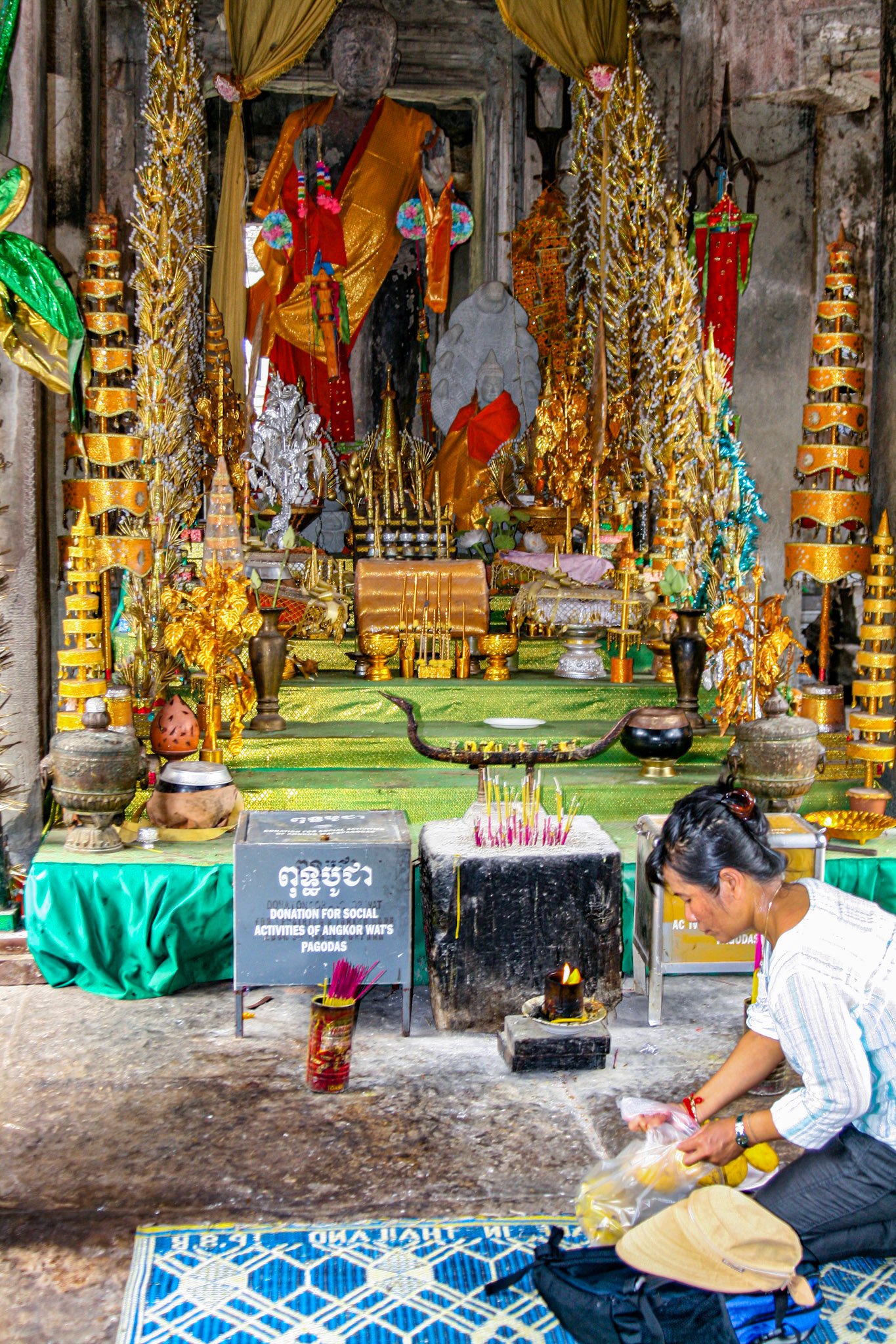 Buddhism proliferated in the Cambodian region during the 13th century. Gradually, it became the dominant religion of Cambodia and Angkor Wat, along with other Hindu monuments, were repurposed for Buddhist worship. Buddhist iconography was added alongside the existing Hindu symbols and sculptures of Buddha were erected. The temple continues to be used for Buddhist worship to this day. 