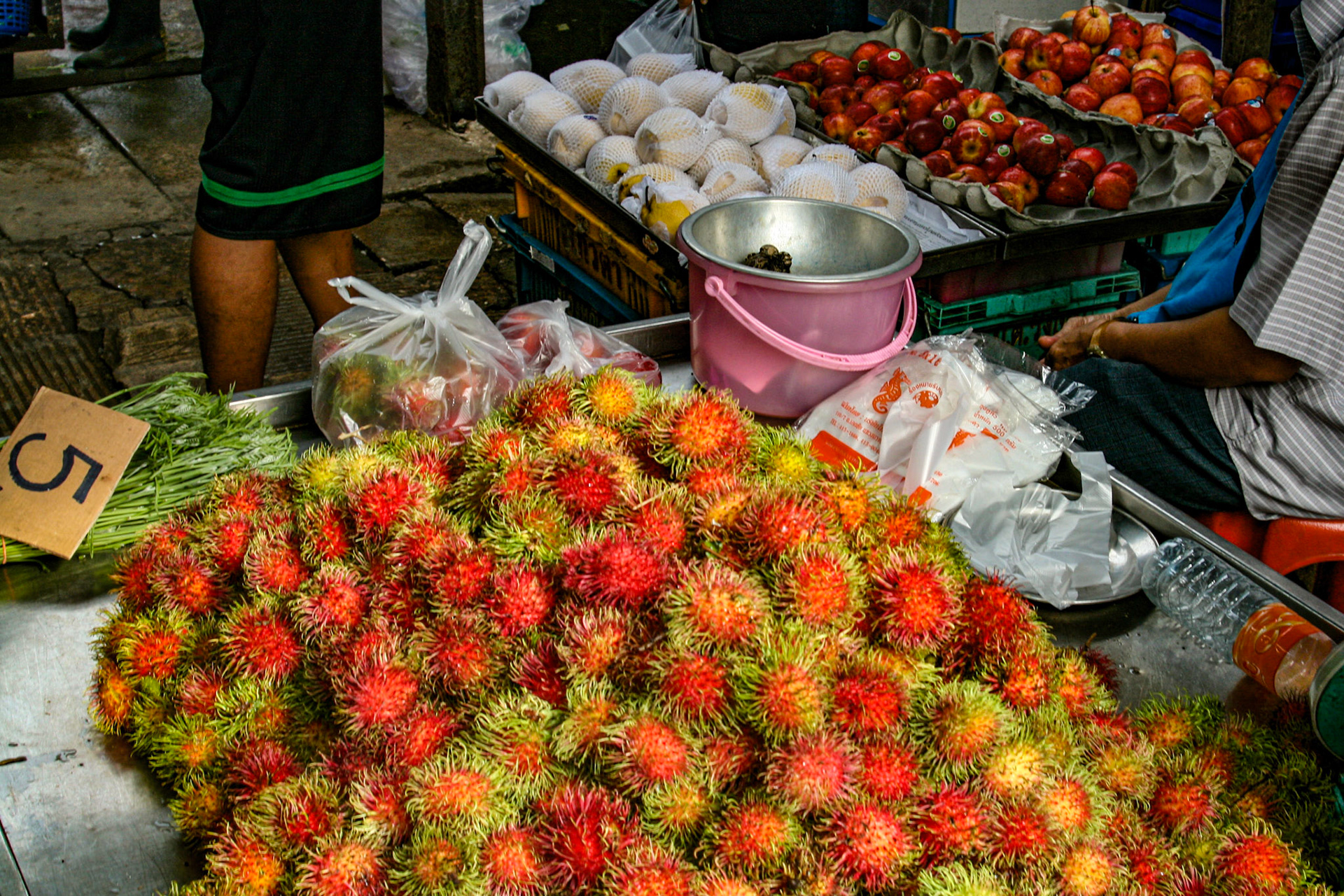 There are tropical fruits and vegetables such as lychee, durian, and mango in big brightly colored piles, variety of dried spices, pastes and herbs, freshly caught seafood and other local foods. 