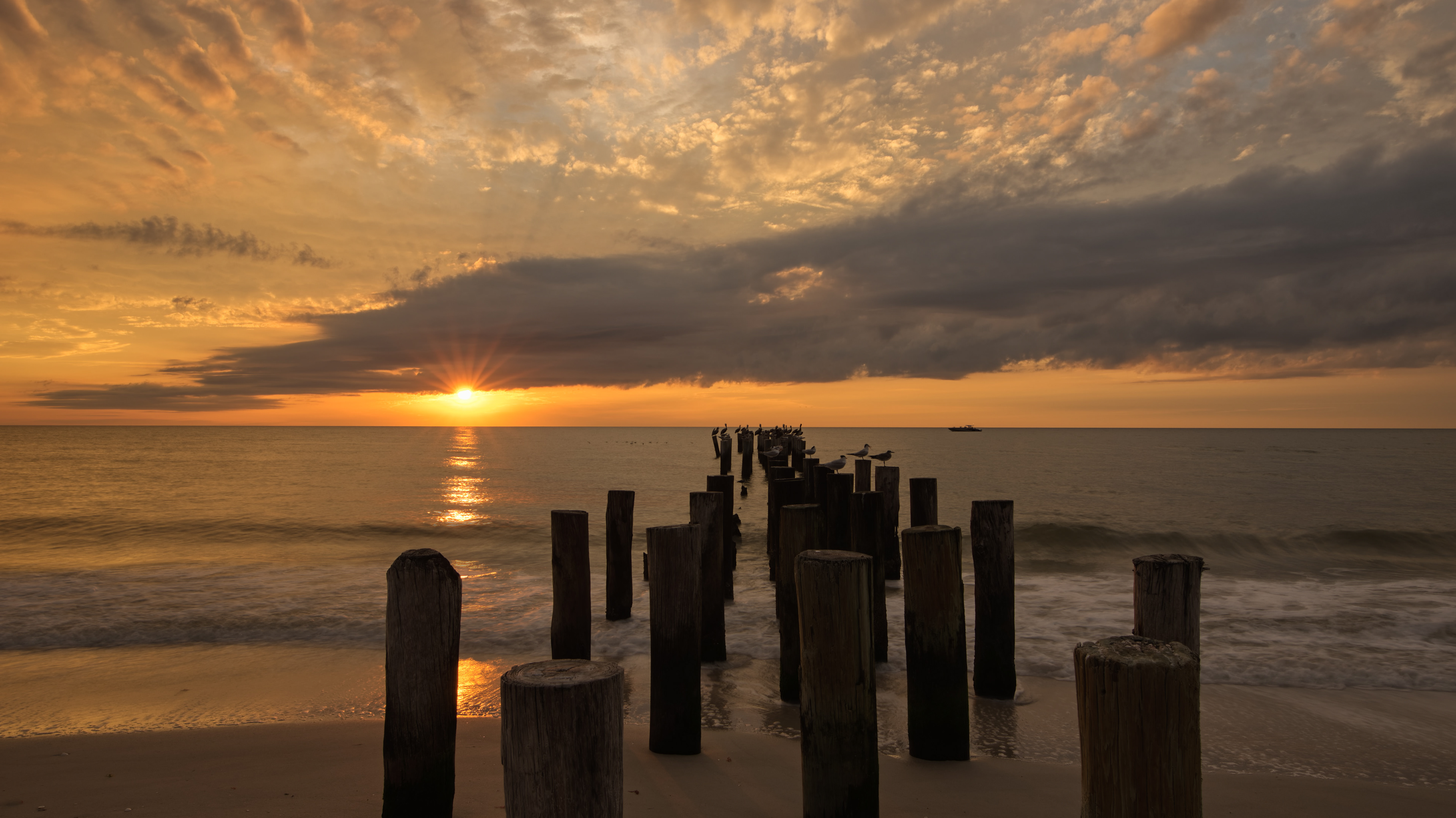Sun Set Over Old Naples Pier Pilings